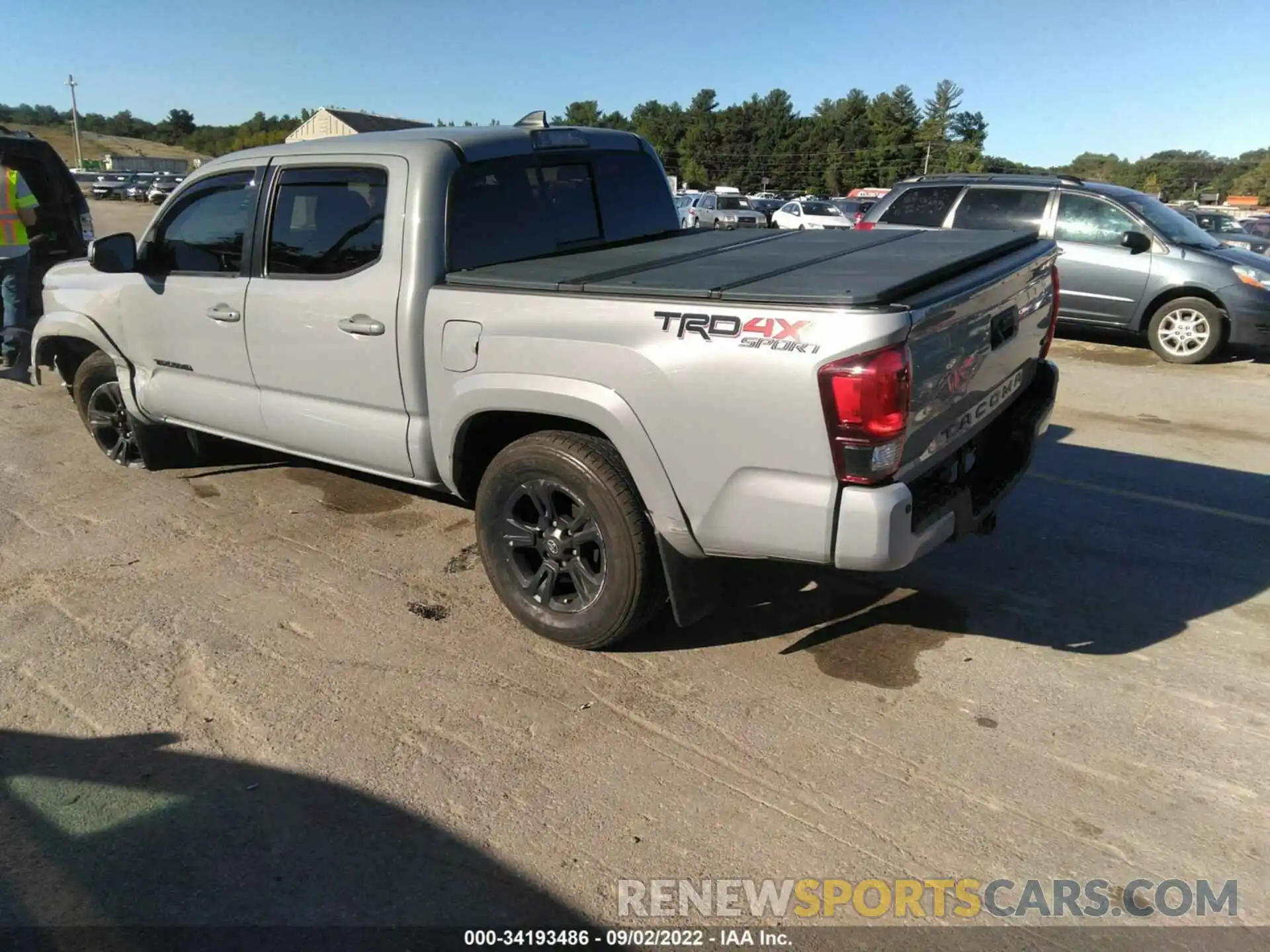 3 Photograph of a damaged car 3TMCZ5AN5KM209826 TOYOTA TACOMA 4WD 2019