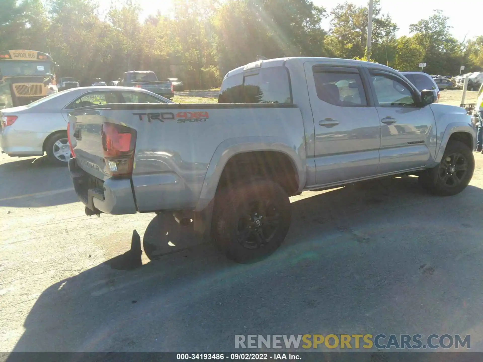 4 Photograph of a damaged car 3TMCZ5AN5KM209826 TOYOTA TACOMA 4WD 2019