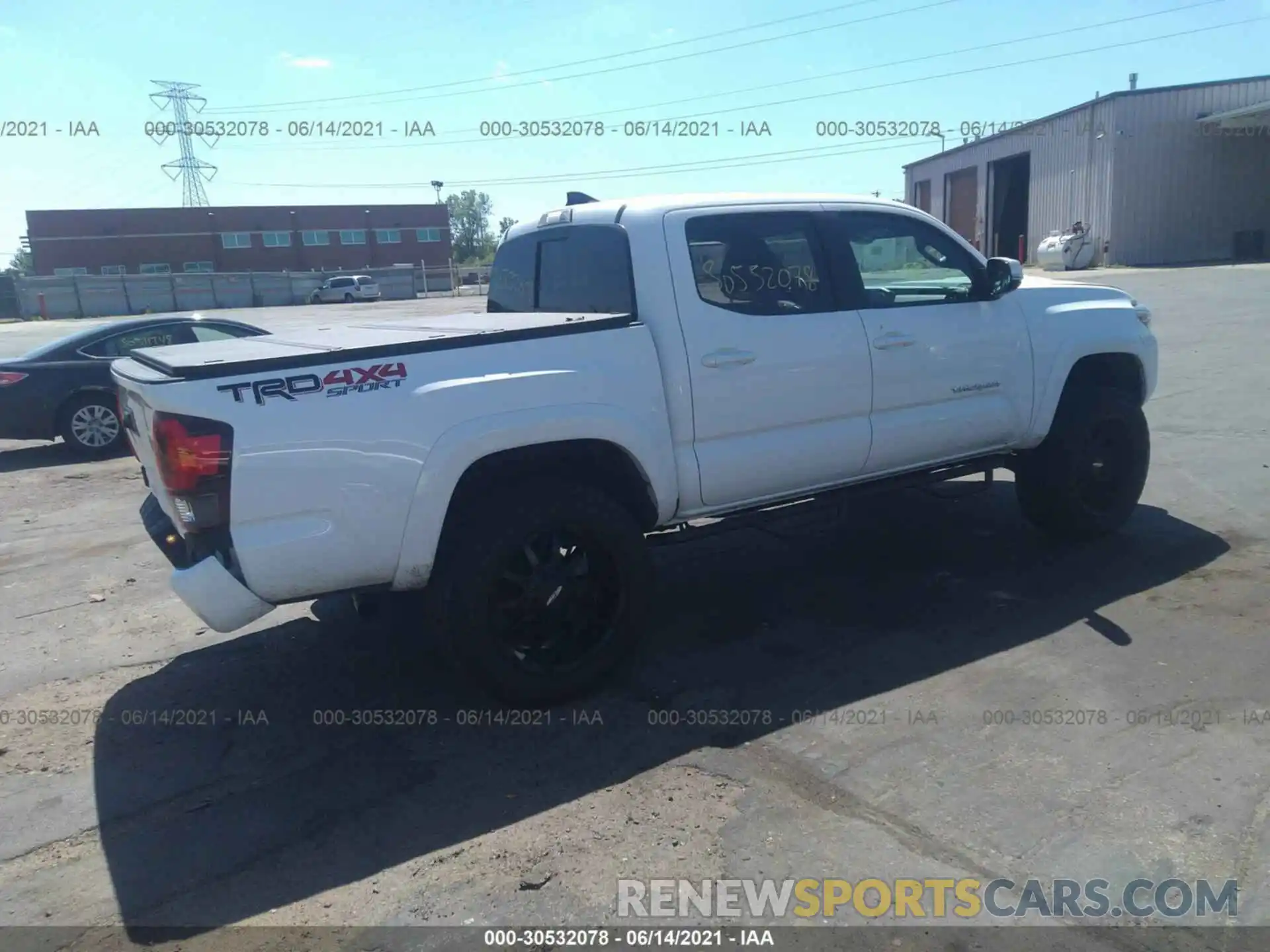 4 Photograph of a damaged car 3TMCZ5AN5KM215030 TOYOTA TACOMA 4WD 2019