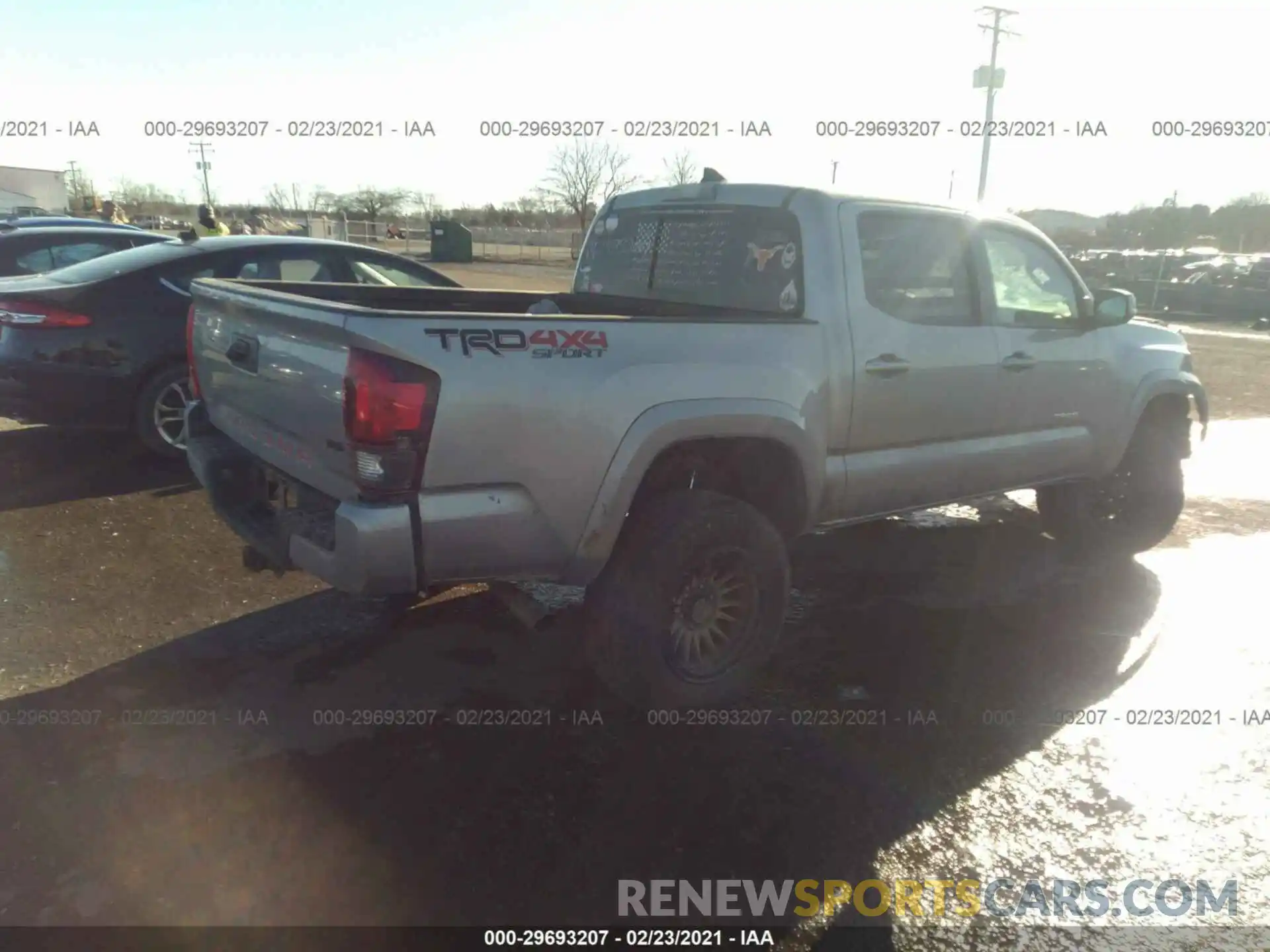 4 Photograph of a damaged car 3TMCZ5AN5KM215268 TOYOTA TACOMA 4WD 2019