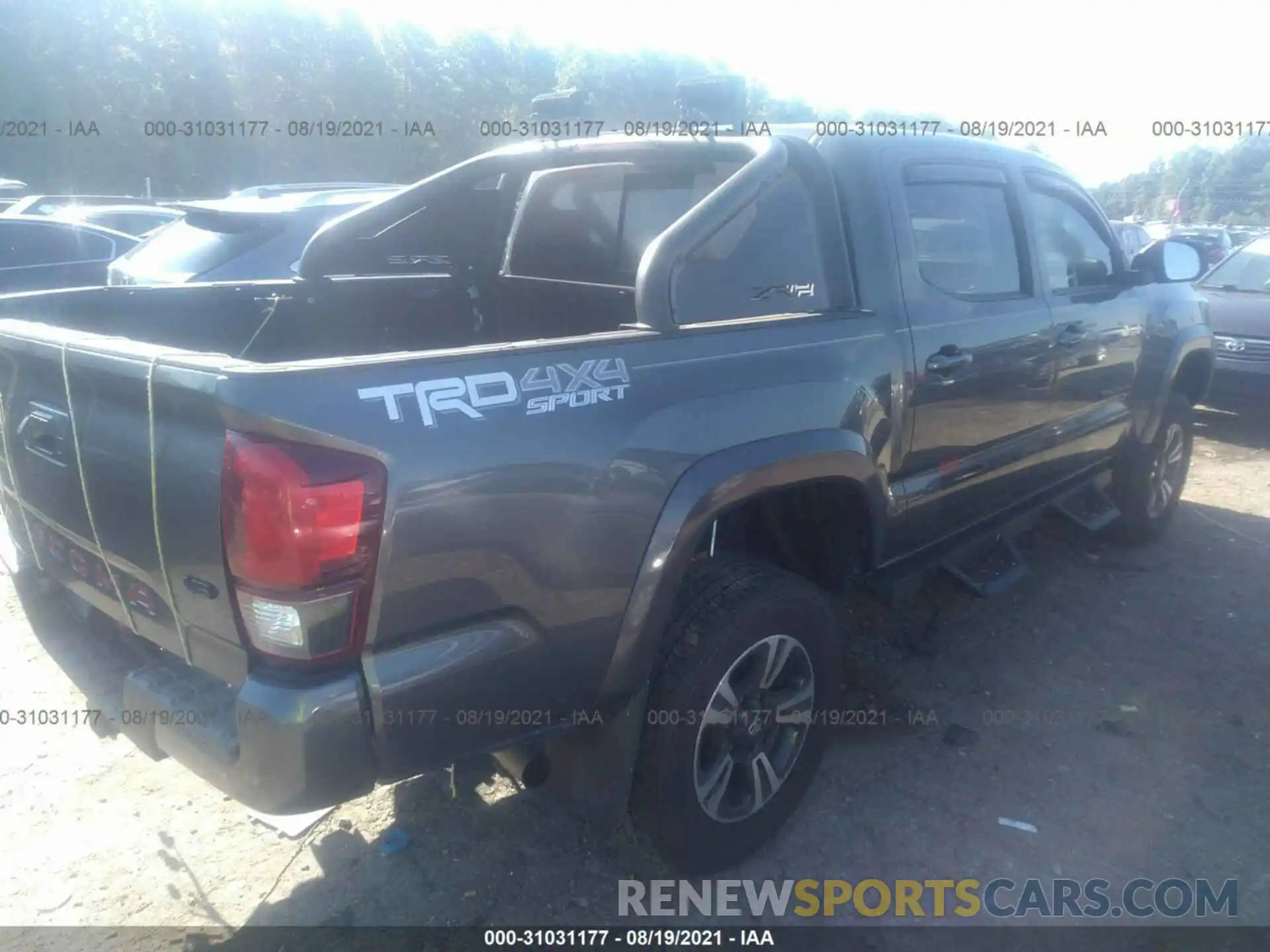 4 Photograph of a damaged car 3TMCZ5AN5KM215769 TOYOTA TACOMA 4WD 2019