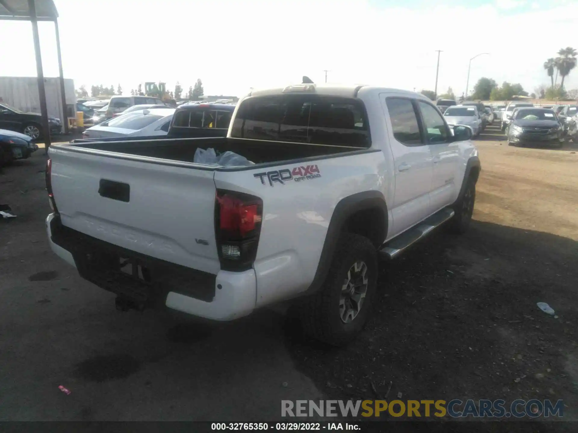 4 Photograph of a damaged car 3TMCZ5AN5KM227324 TOYOTA TACOMA 4WD 2019