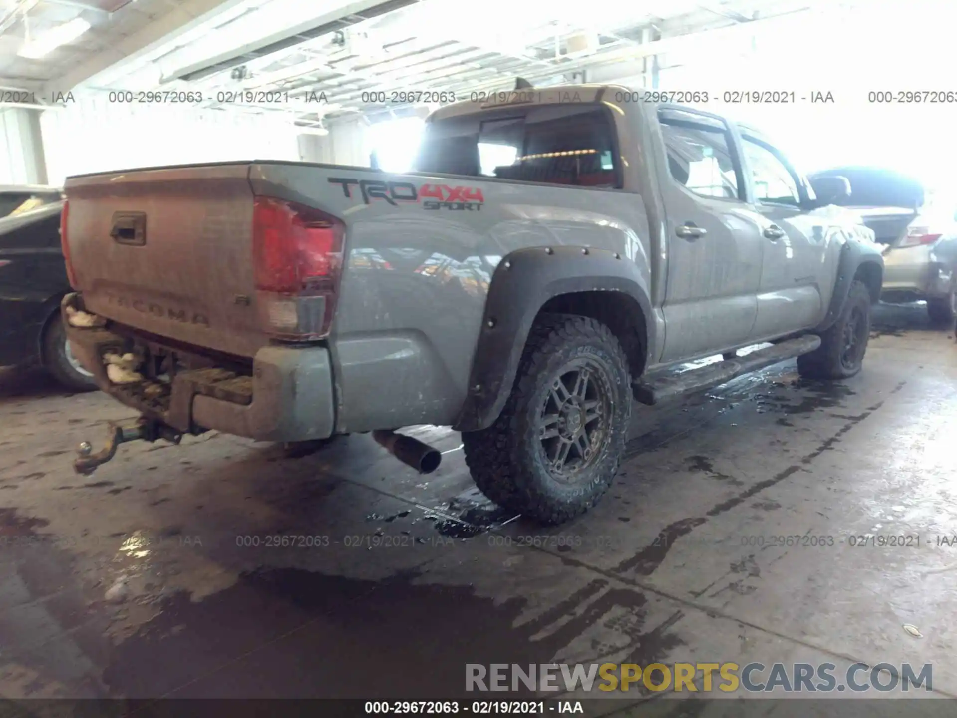 4 Photograph of a damaged car 3TMCZ5AN5KM230921 TOYOTA TACOMA 4WD 2019