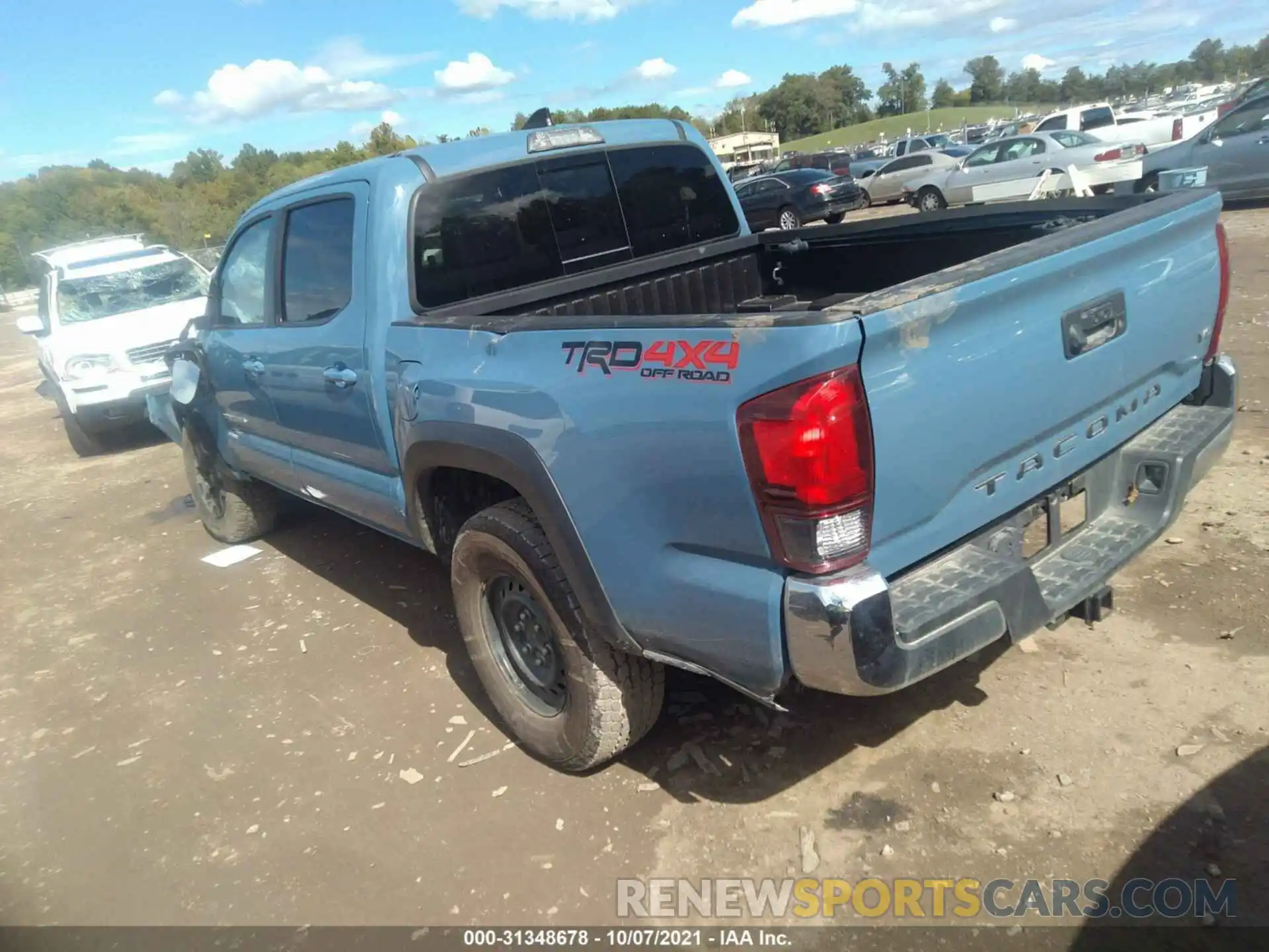 3 Photograph of a damaged car 3TMCZ5AN5KM231955 TOYOTA TACOMA 4WD 2019