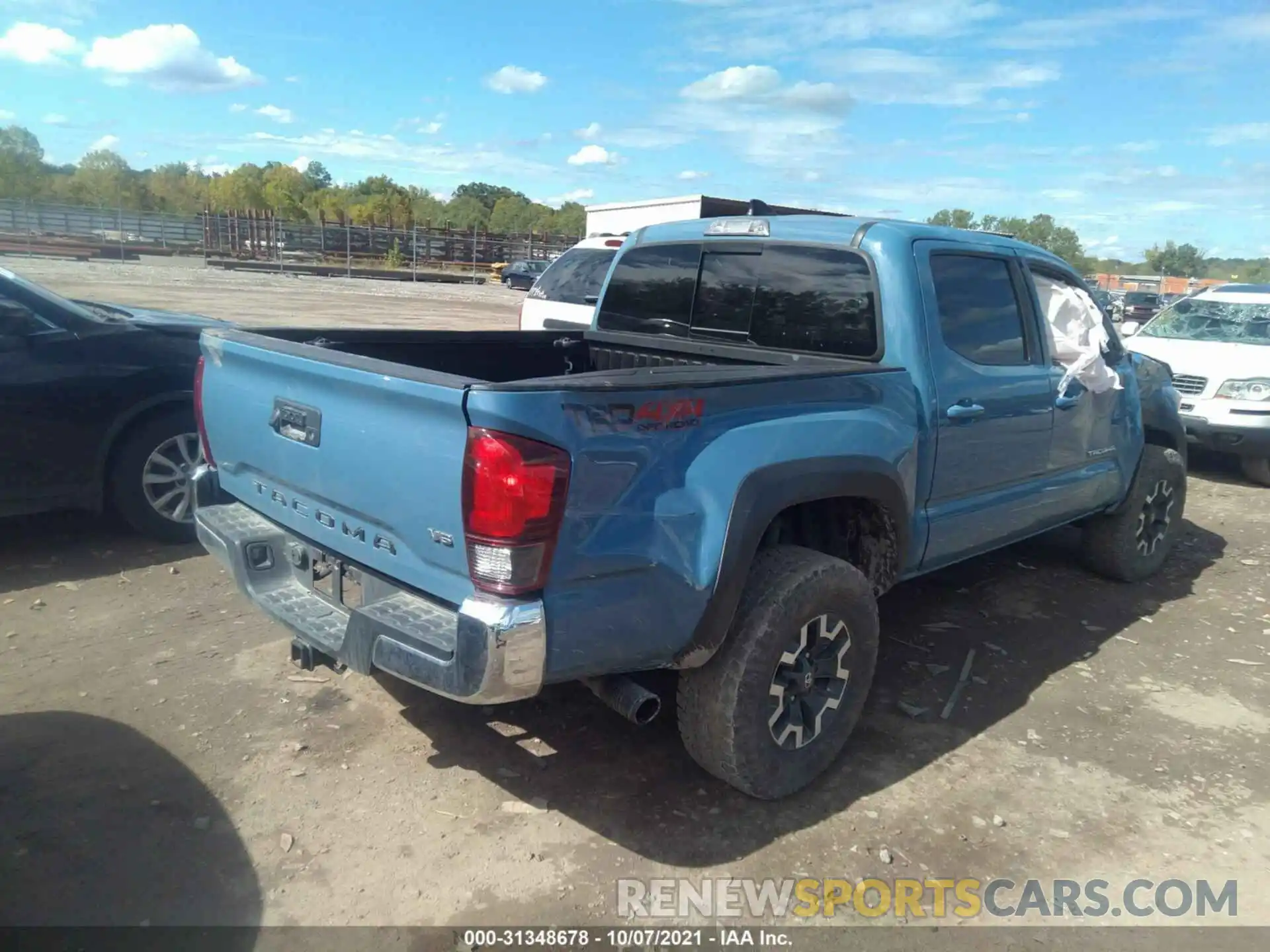 4 Photograph of a damaged car 3TMCZ5AN5KM231955 TOYOTA TACOMA 4WD 2019