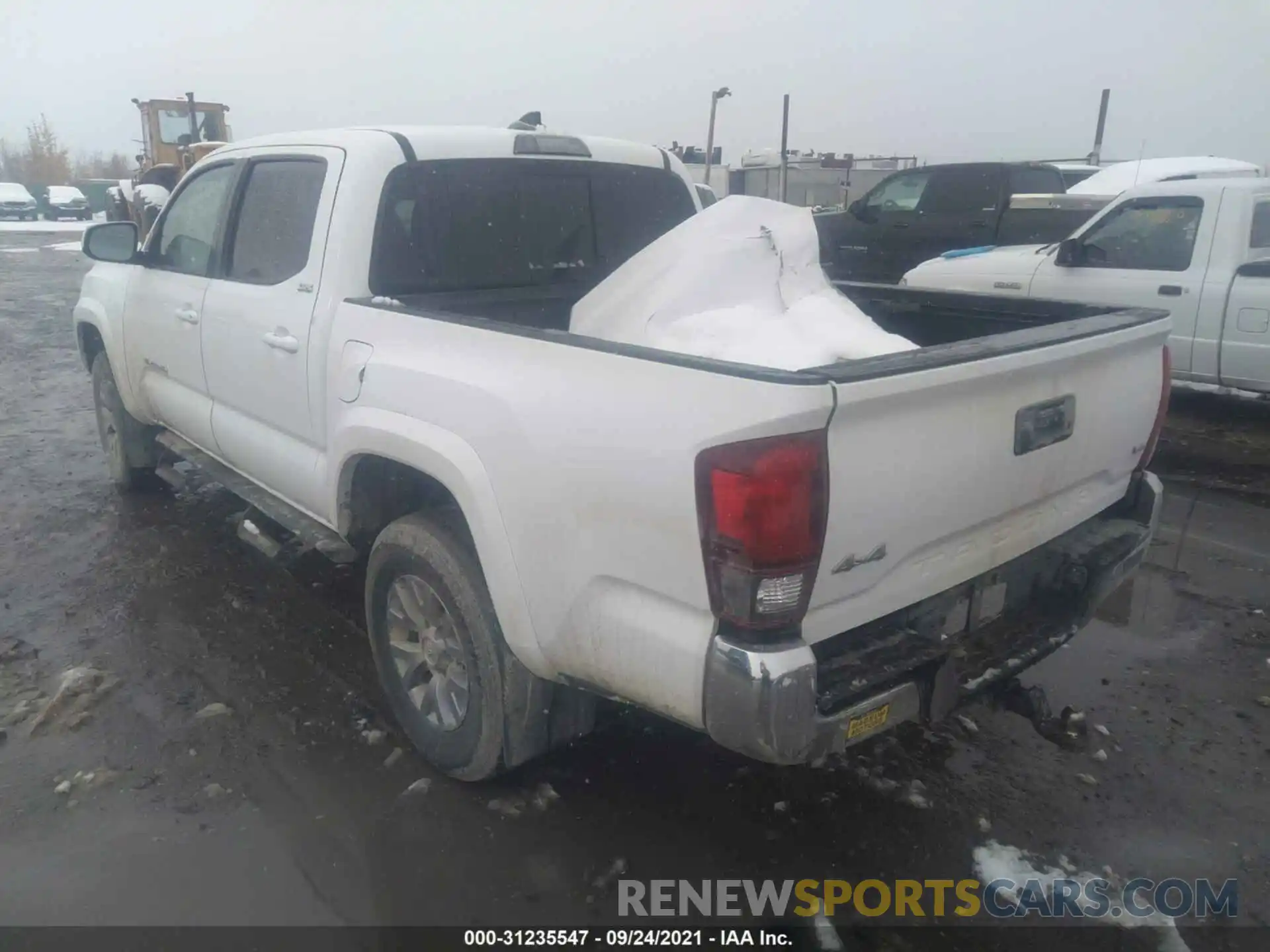 3 Photograph of a damaged car 3TMCZ5AN5KM245886 TOYOTA TACOMA 4WD 2019