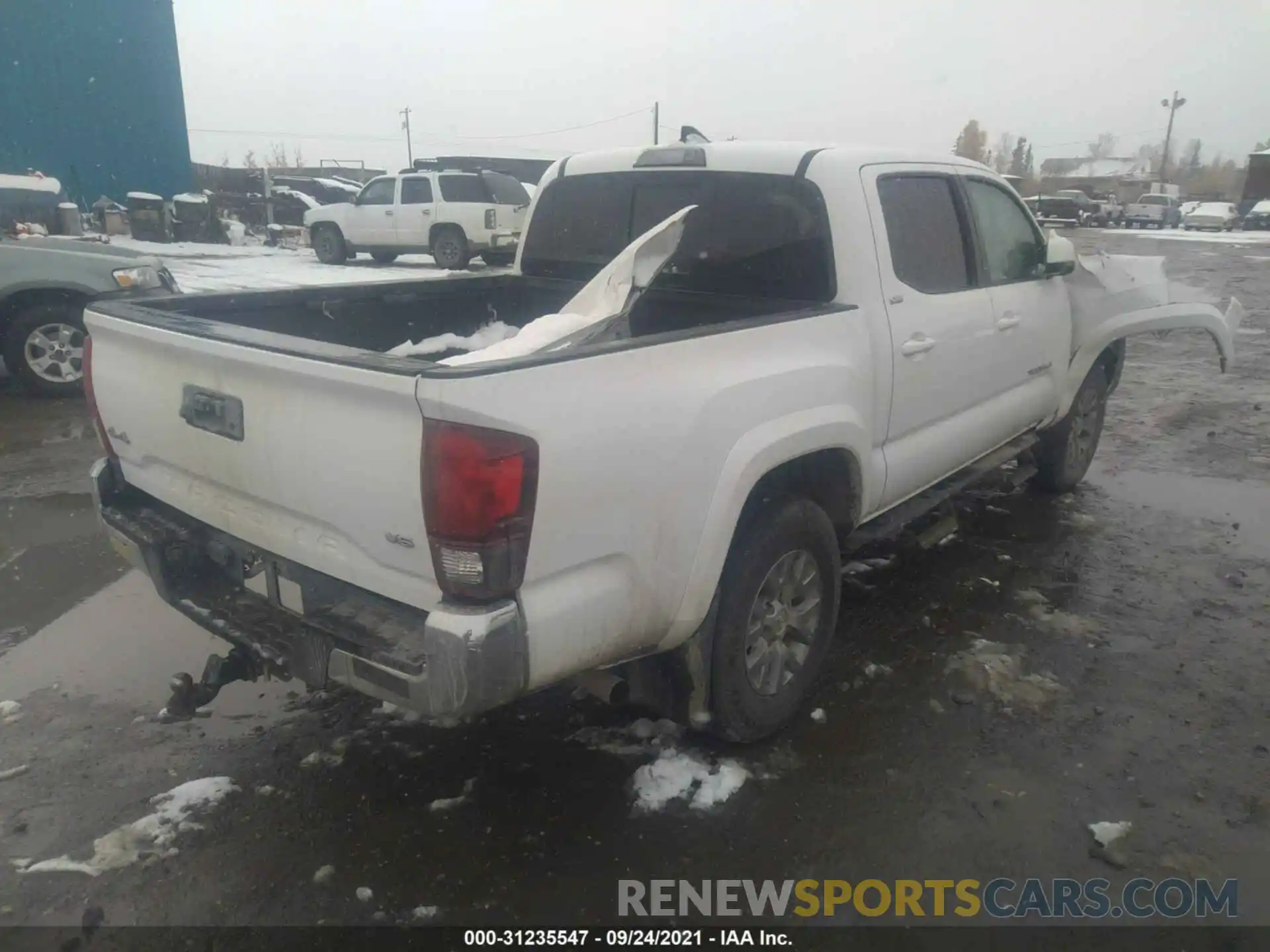 4 Photograph of a damaged car 3TMCZ5AN5KM245886 TOYOTA TACOMA 4WD 2019