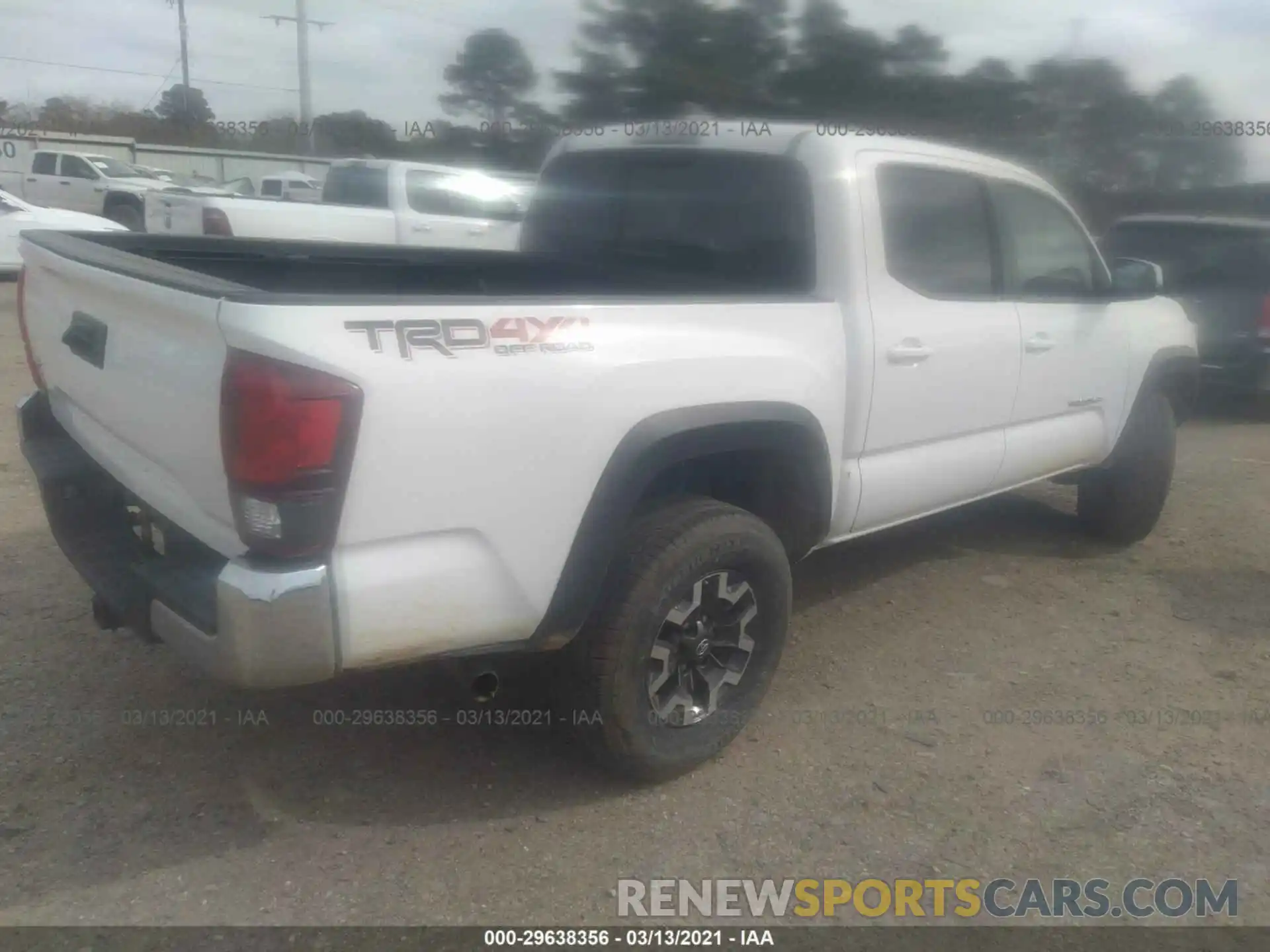 4 Photograph of a damaged car 3TMCZ5AN5KM250747 TOYOTA TACOMA 4WD 2019