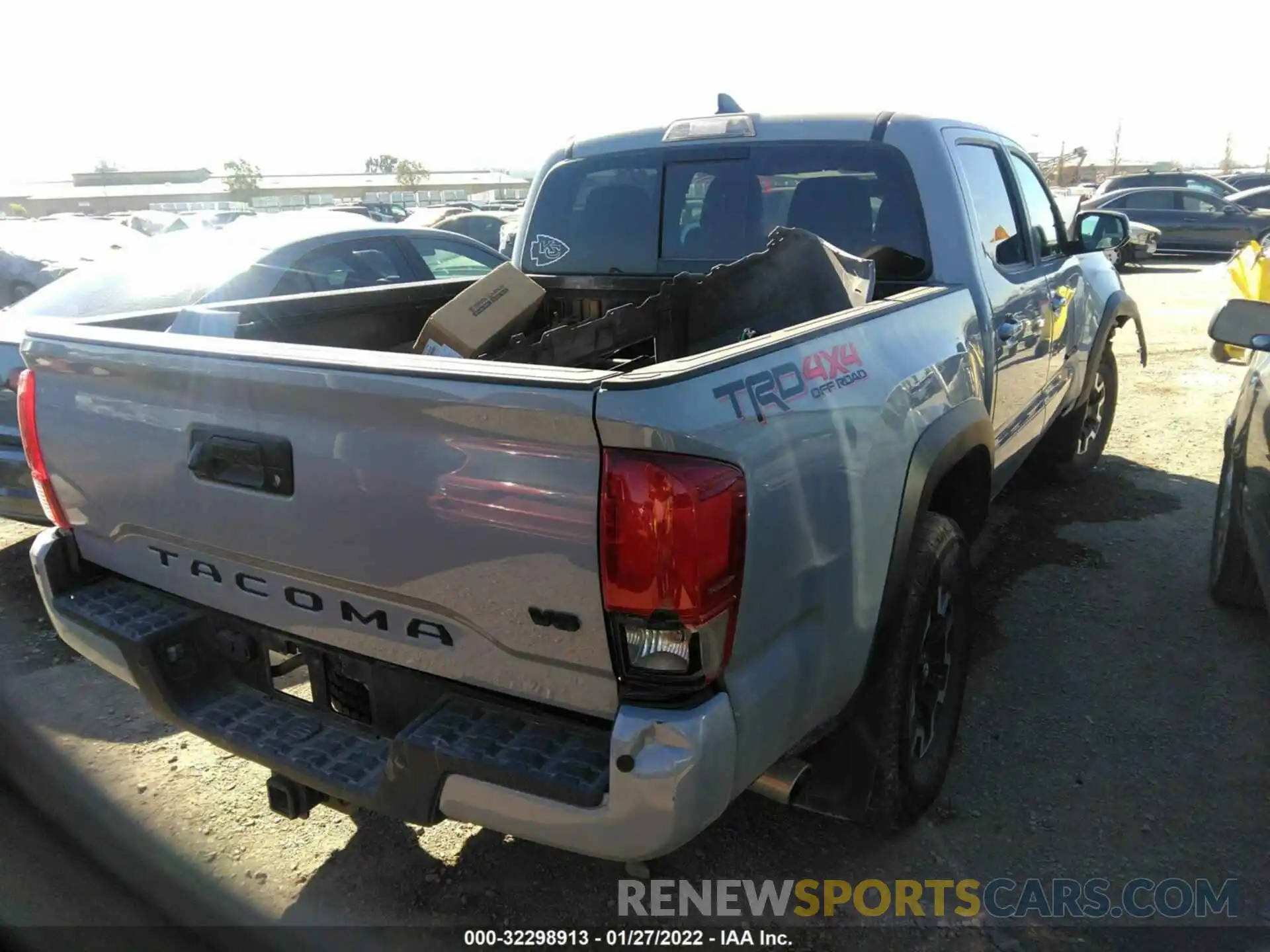 4 Photograph of a damaged car 3TMCZ5AN5KM251641 TOYOTA TACOMA 4WD 2019