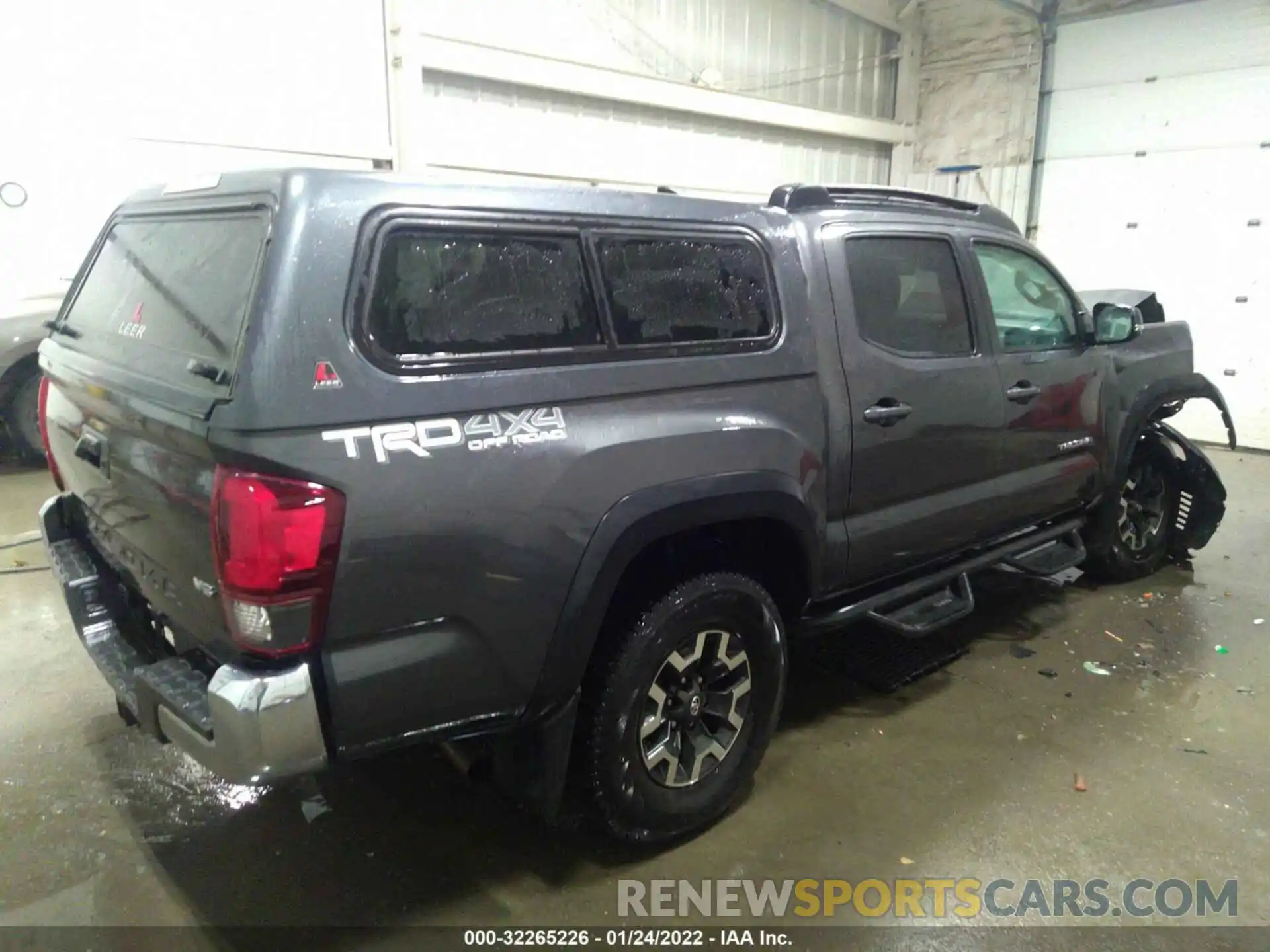 4 Photograph of a damaged car 3TMCZ5AN5KM255463 TOYOTA TACOMA 4WD 2019