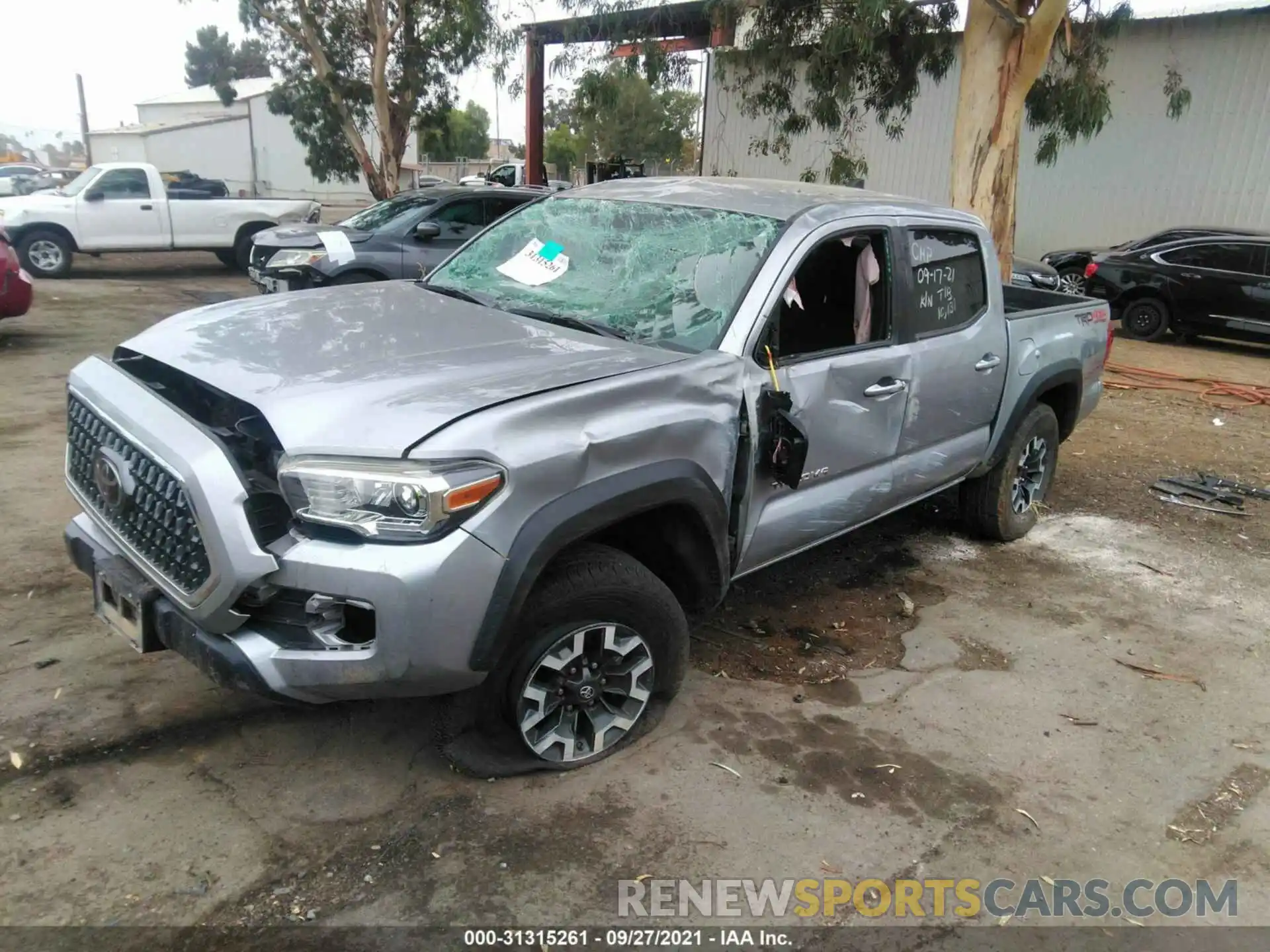 2 Photograph of a damaged car 3TMCZ5AN5KM259223 TOYOTA TACOMA 4WD 2019