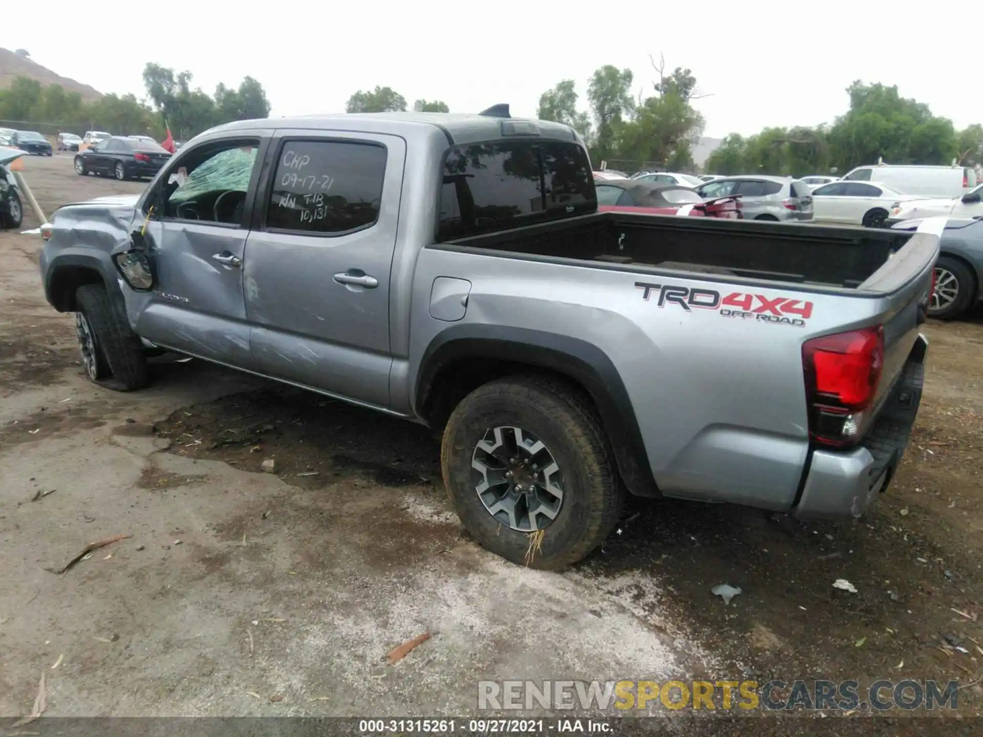 3 Photograph of a damaged car 3TMCZ5AN5KM259223 TOYOTA TACOMA 4WD 2019