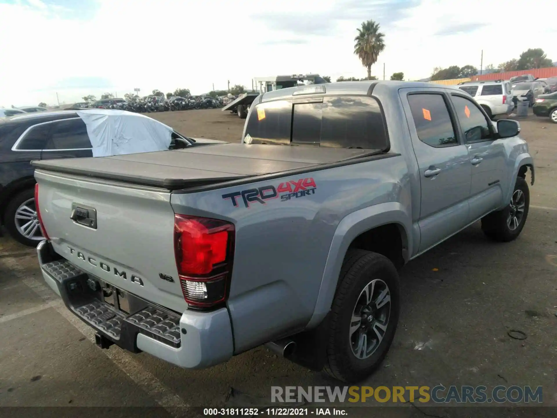 4 Photograph of a damaged car 3TMCZ5AN5KM260713 TOYOTA TACOMA 4WD 2019