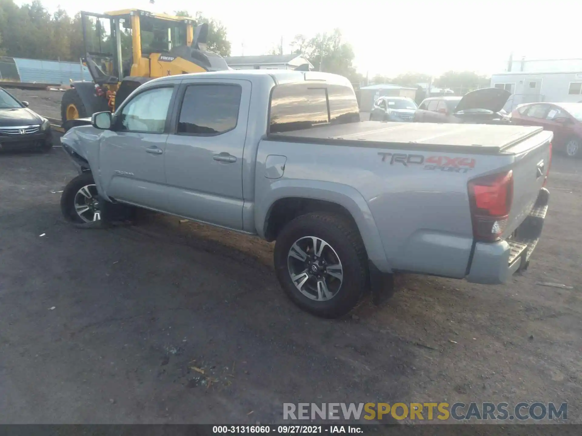 3 Photograph of a damaged car 3TMCZ5AN5KM268679 TOYOTA TACOMA 4WD 2019