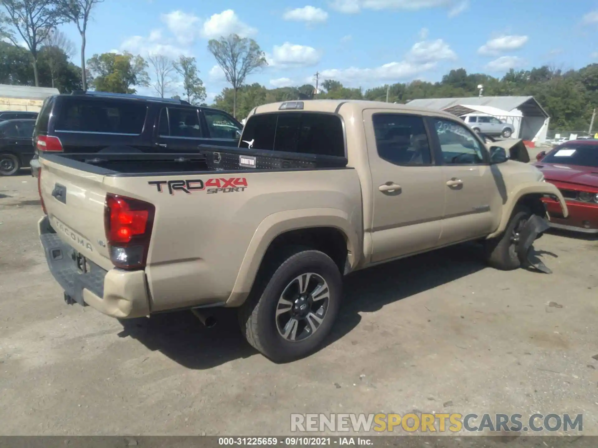 4 Photograph of a damaged car 3TMCZ5AN5KM273770 TOYOTA TACOMA 4WD 2019