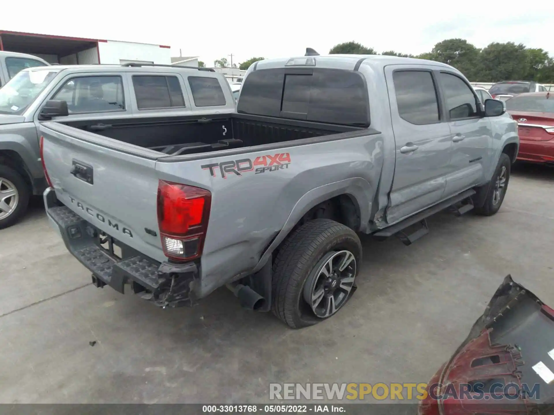 4 Photograph of a damaged car 3TMCZ5AN5KM285305 TOYOTA TACOMA 4WD 2019