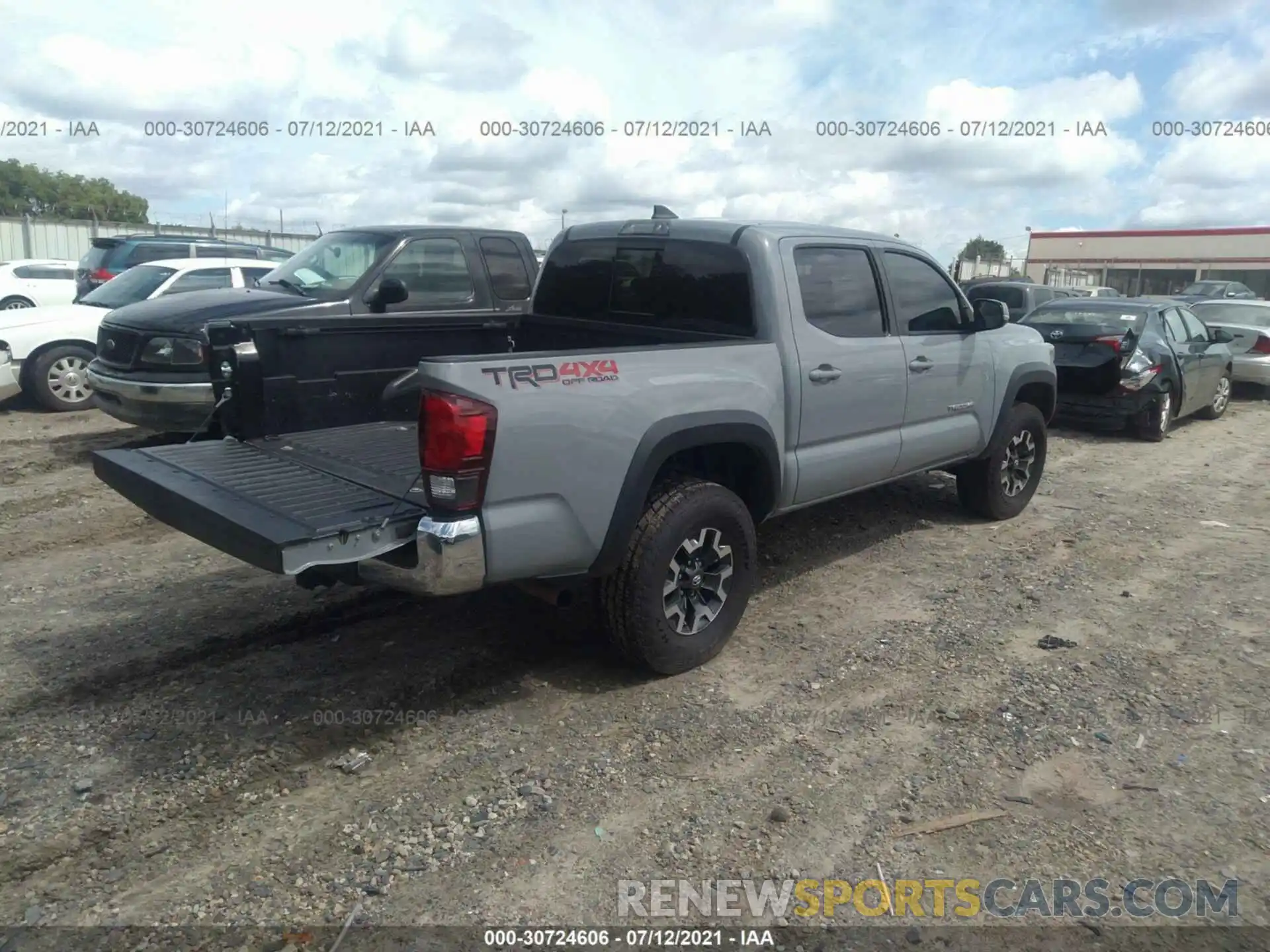 4 Photograph of a damaged car 3TMCZ5AN6KM191076 TOYOTA TACOMA 4WD 2019