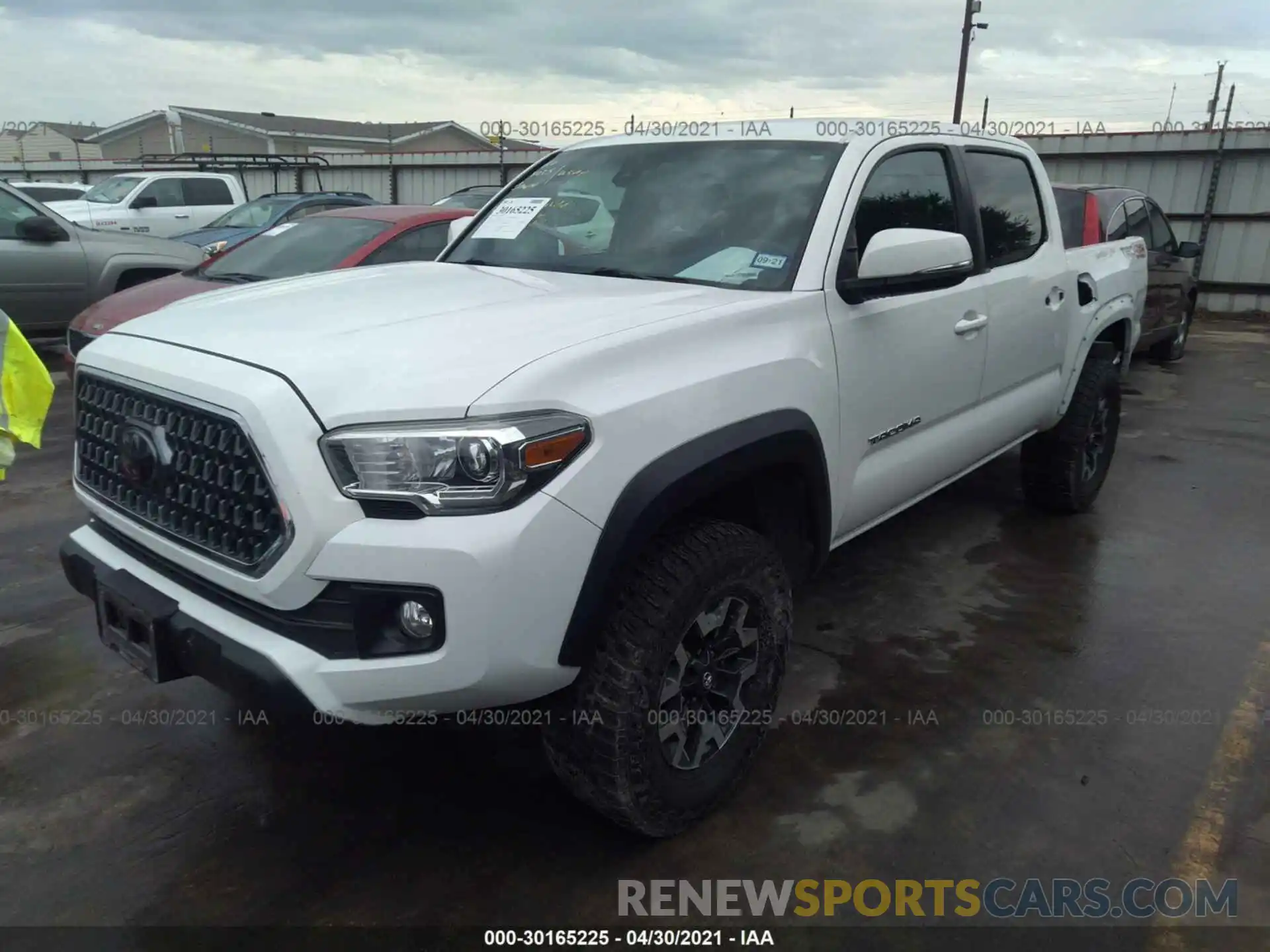 2 Photograph of a damaged car 3TMCZ5AN6KM193670 TOYOTA TACOMA 4WD 2019