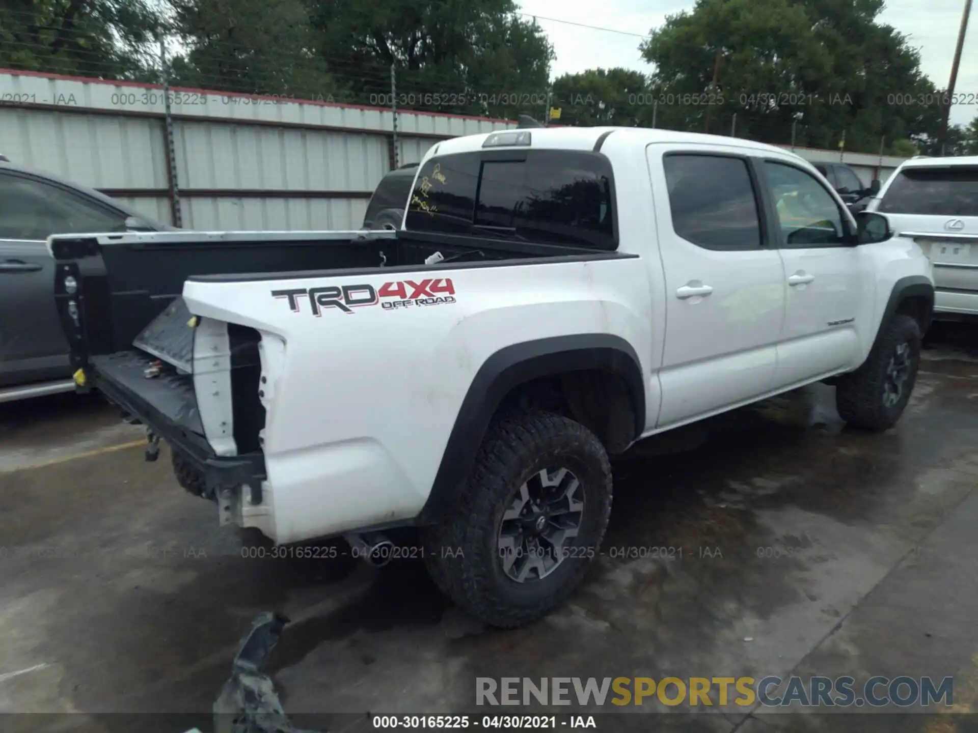 4 Photograph of a damaged car 3TMCZ5AN6KM193670 TOYOTA TACOMA 4WD 2019