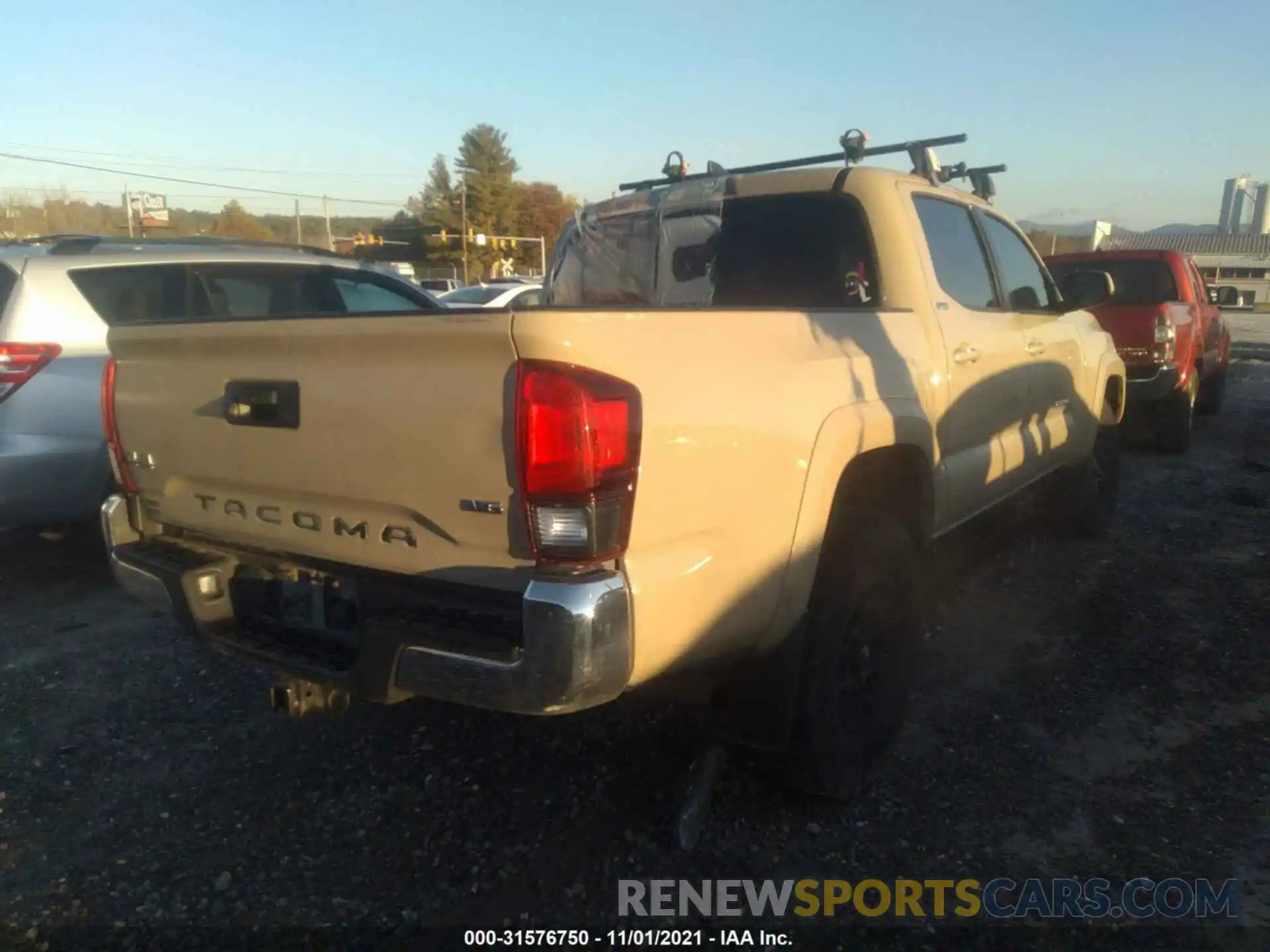 4 Photograph of a damaged car 3TMCZ5AN6KM197363 TOYOTA TACOMA 4WD 2019