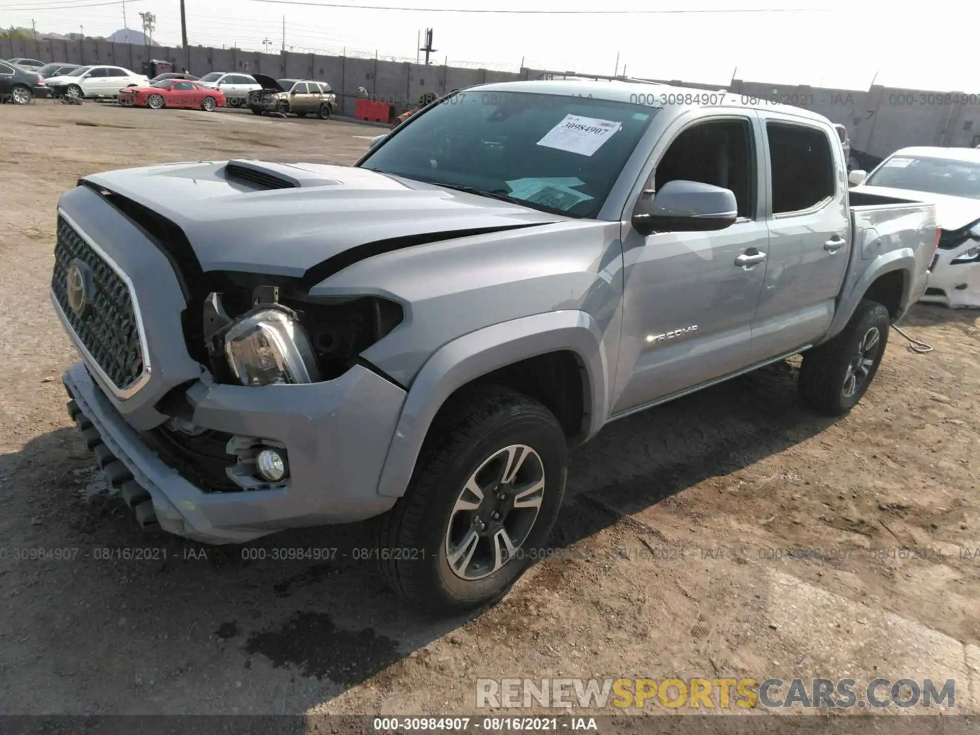 2 Photograph of a damaged car 3TMCZ5AN6KM208216 TOYOTA TACOMA 4WD 2019