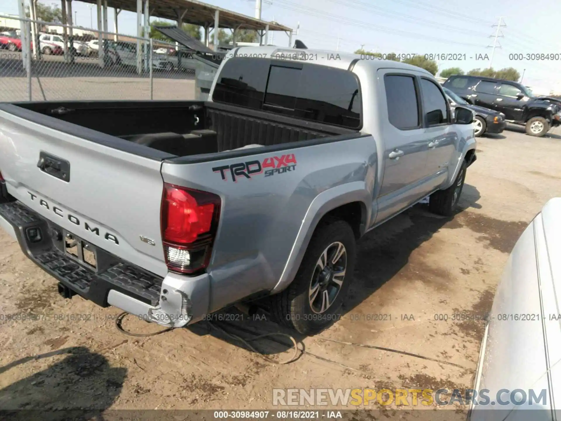 4 Photograph of a damaged car 3TMCZ5AN6KM208216 TOYOTA TACOMA 4WD 2019