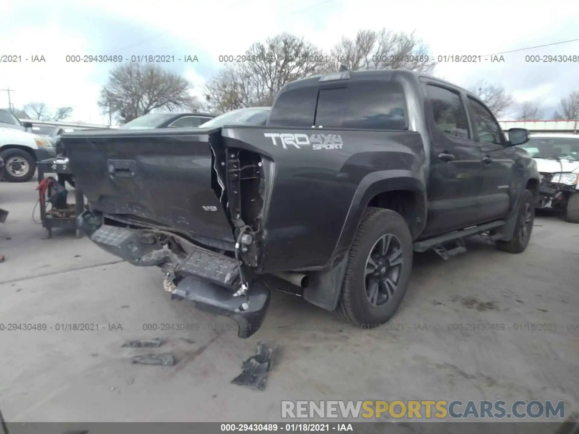 4 Photograph of a damaged car 3TMCZ5AN6KM219393 TOYOTA TACOMA 4WD 2019