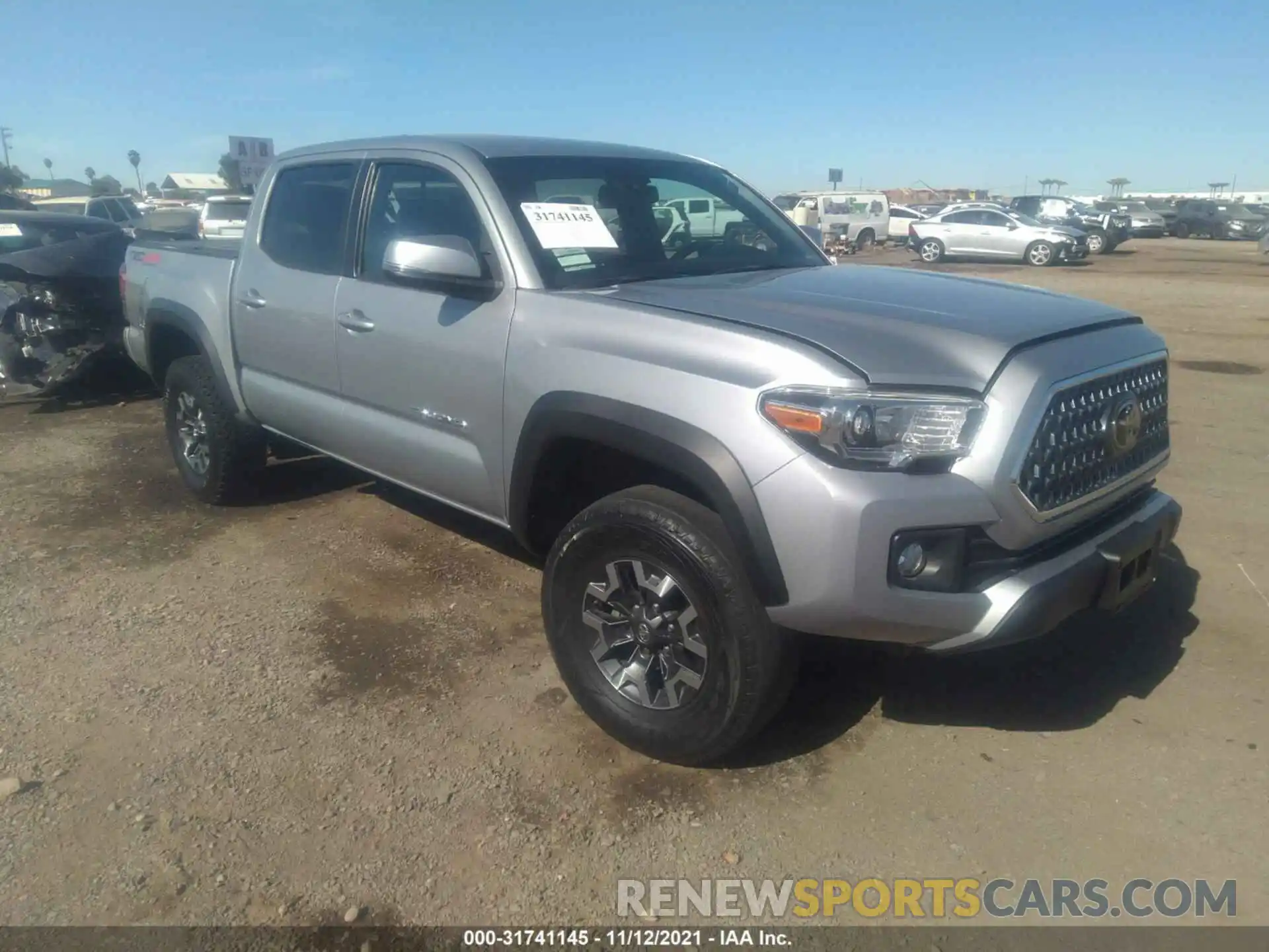 1 Photograph of a damaged car 3TMCZ5AN6KM223234 TOYOTA TACOMA 4WD 2019