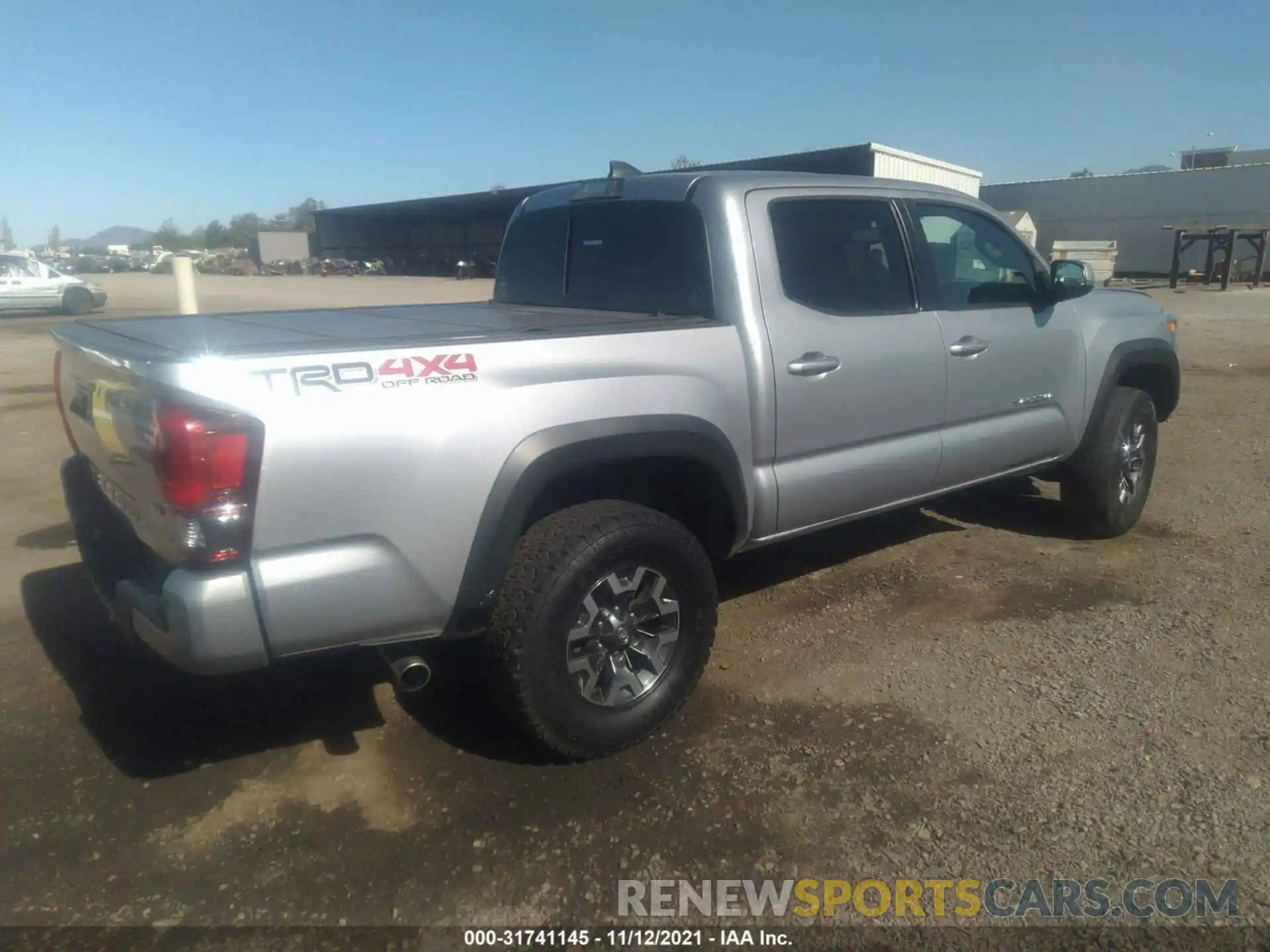 4 Photograph of a damaged car 3TMCZ5AN6KM223234 TOYOTA TACOMA 4WD 2019