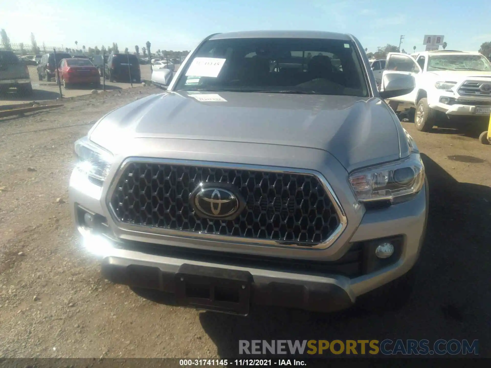 6 Photograph of a damaged car 3TMCZ5AN6KM223234 TOYOTA TACOMA 4WD 2019