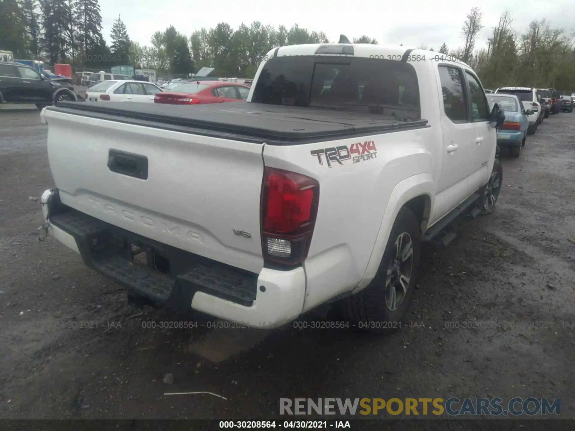 4 Photograph of a damaged car 3TMCZ5AN6KM224304 TOYOTA TACOMA 4WD 2019