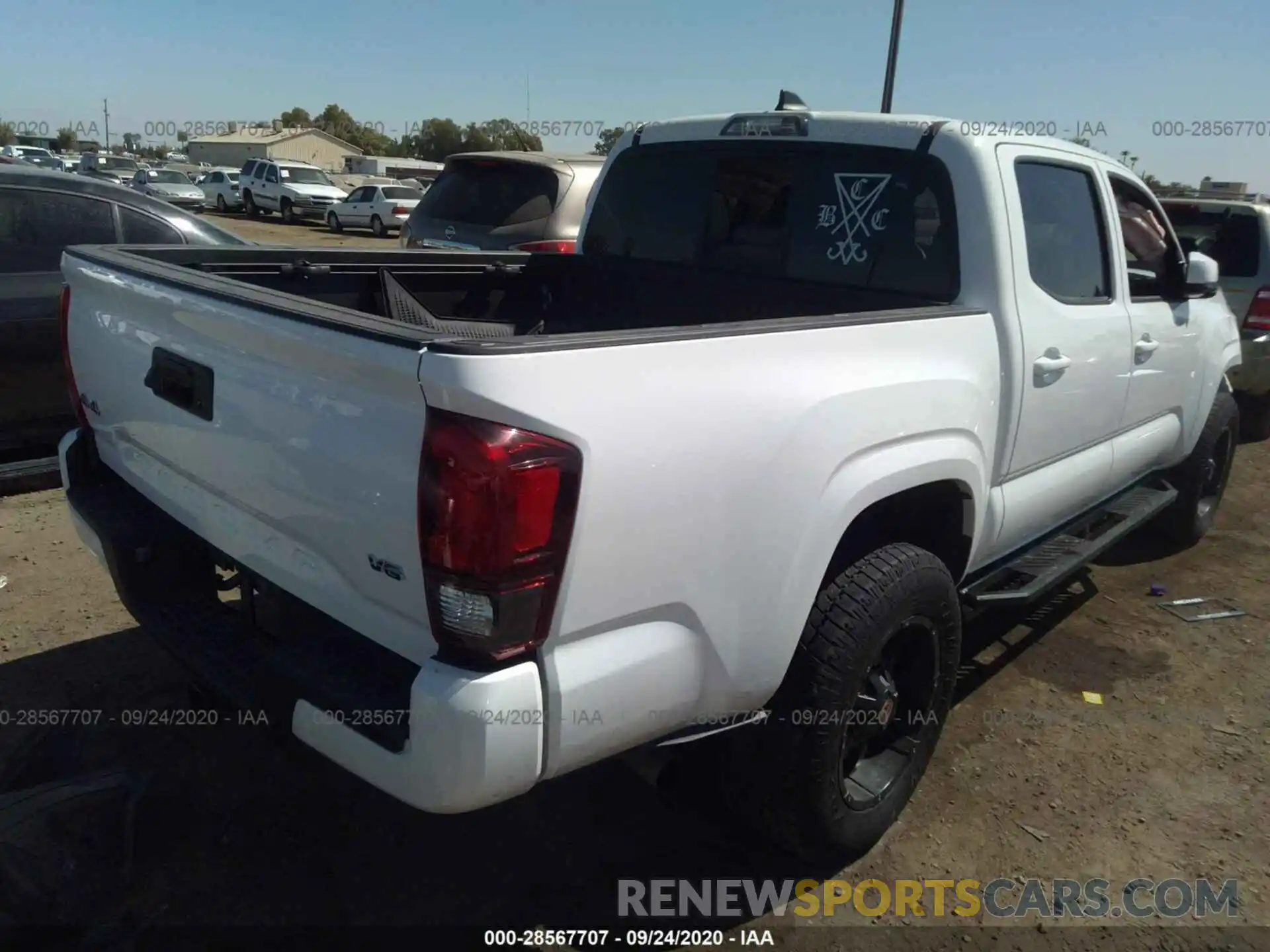 4 Photograph of a damaged car 3TMCZ5AN6KM232211 TOYOTA TACOMA 4WD 2019