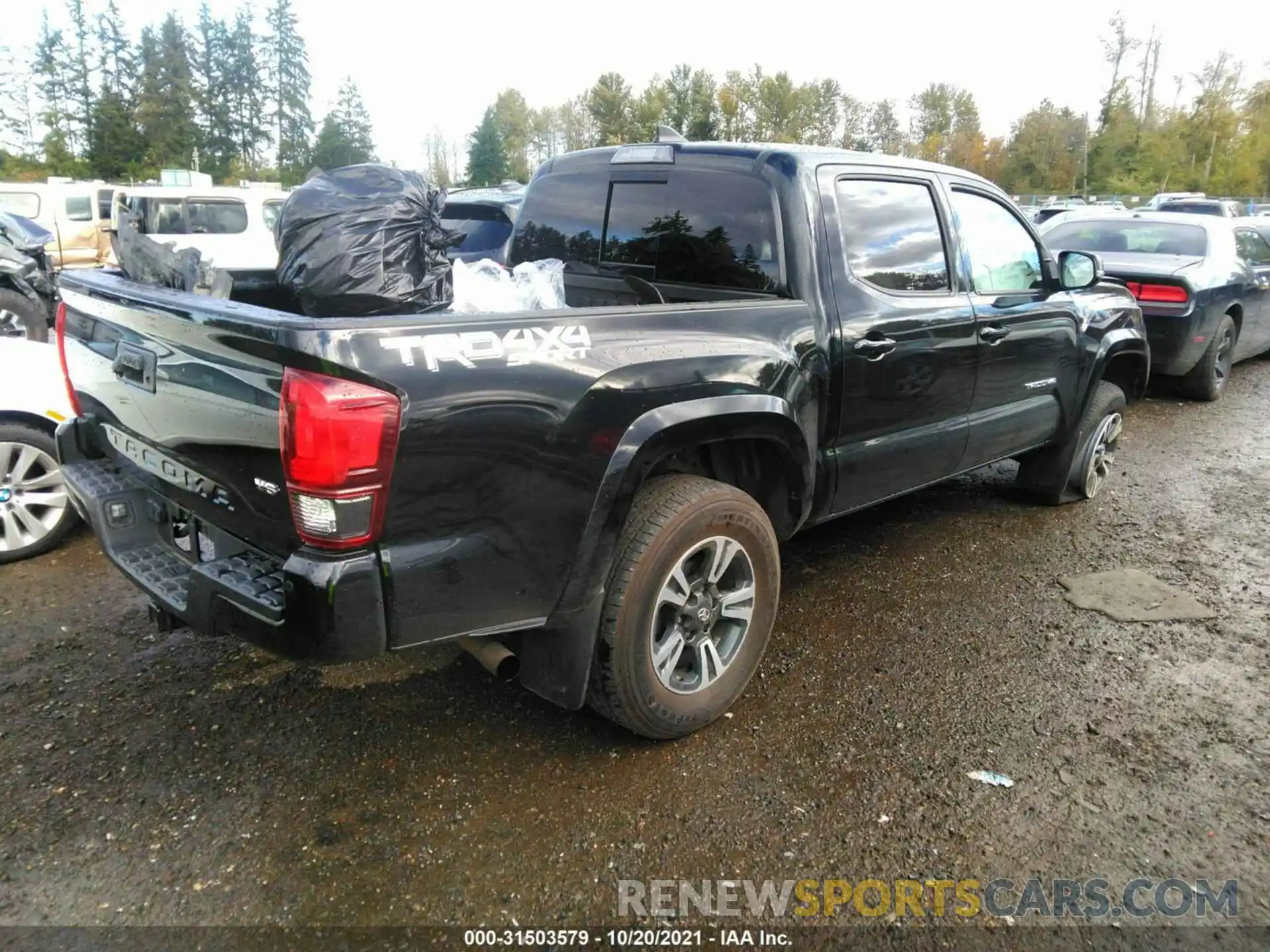 4 Photograph of a damaged car 3TMCZ5AN6KM232225 TOYOTA TACOMA 4WD 2019