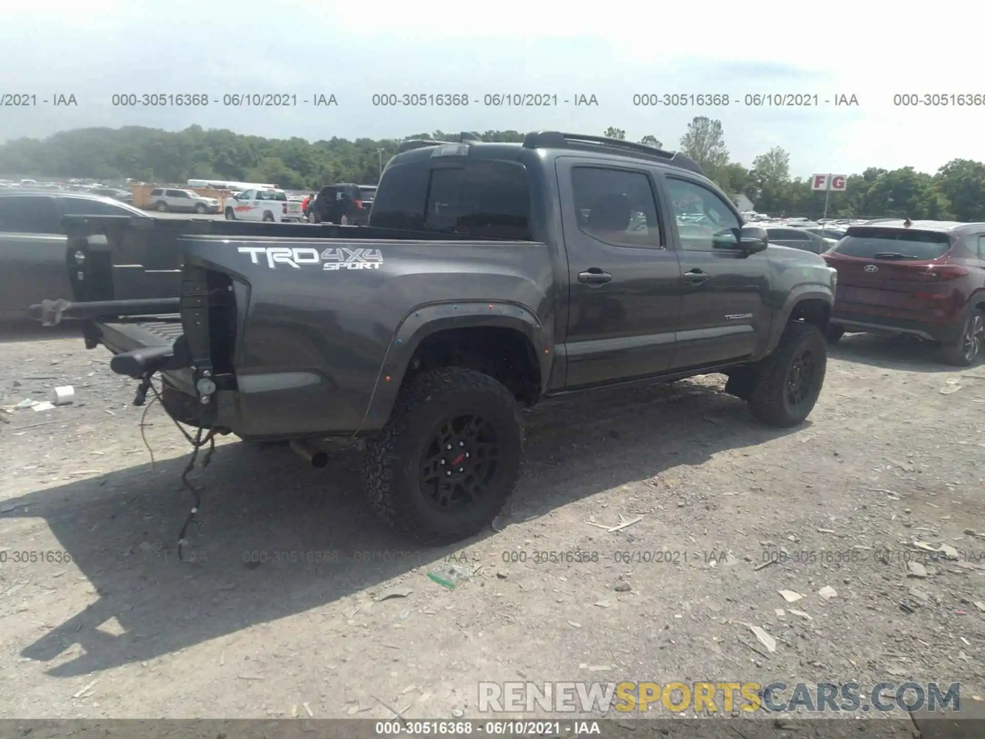 4 Photograph of a damaged car 3TMCZ5AN6KM276001 TOYOTA TACOMA 4WD 2019