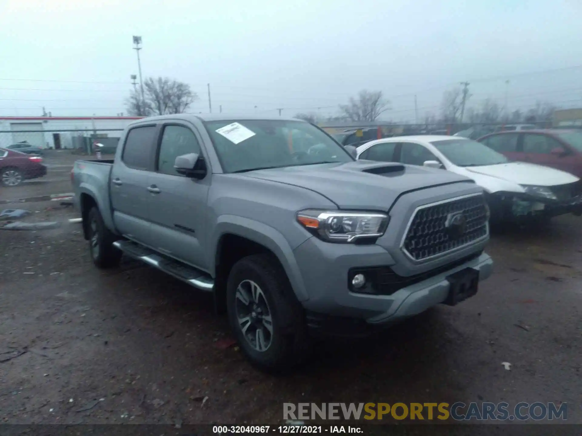 1 Photograph of a damaged car 3TMCZ5AN6KM287385 TOYOTA TACOMA 4WD 2019