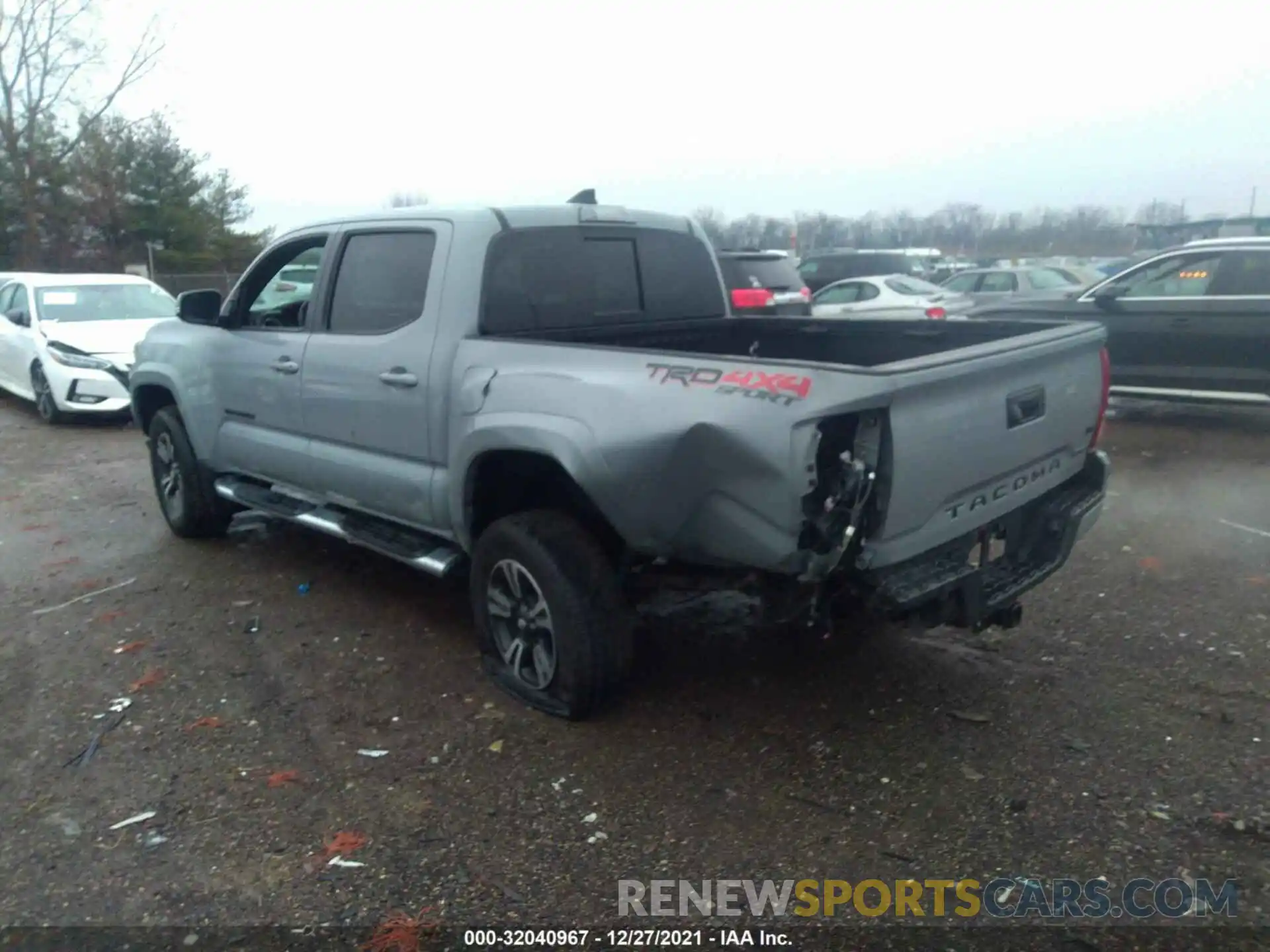 3 Photograph of a damaged car 3TMCZ5AN6KM287385 TOYOTA TACOMA 4WD 2019