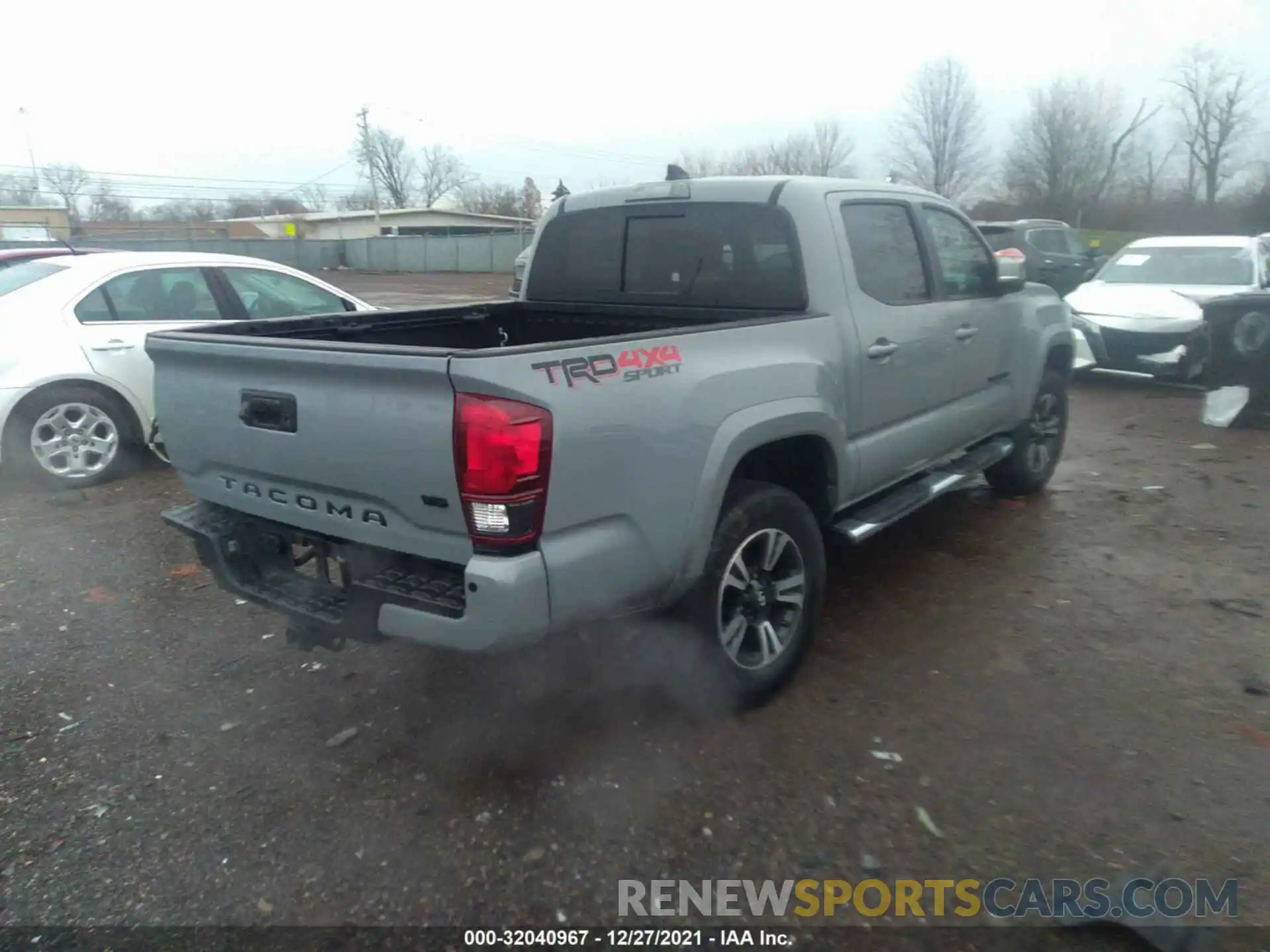 4 Photograph of a damaged car 3TMCZ5AN6KM287385 TOYOTA TACOMA 4WD 2019