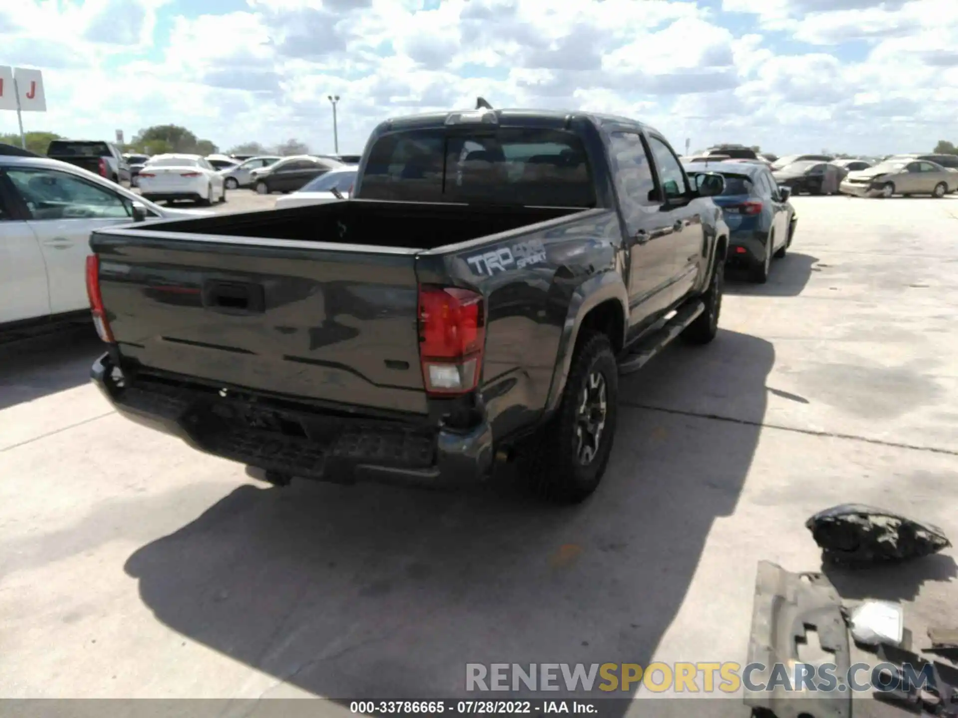 4 Photograph of a damaged car 3TMCZ5AN6KM288102 TOYOTA TACOMA 4WD 2019