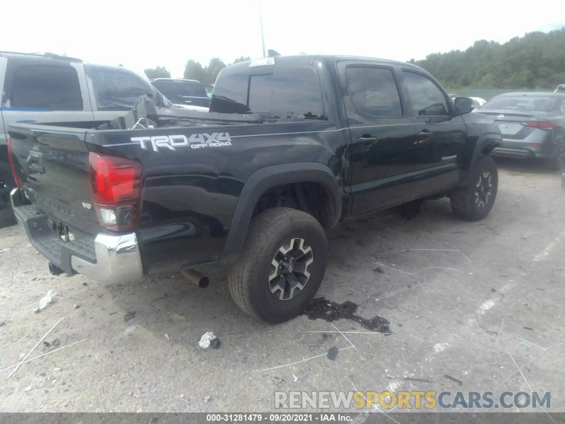 4 Photograph of a damaged car 3TMCZ5AN7KM205583 TOYOTA TACOMA 4WD 2019