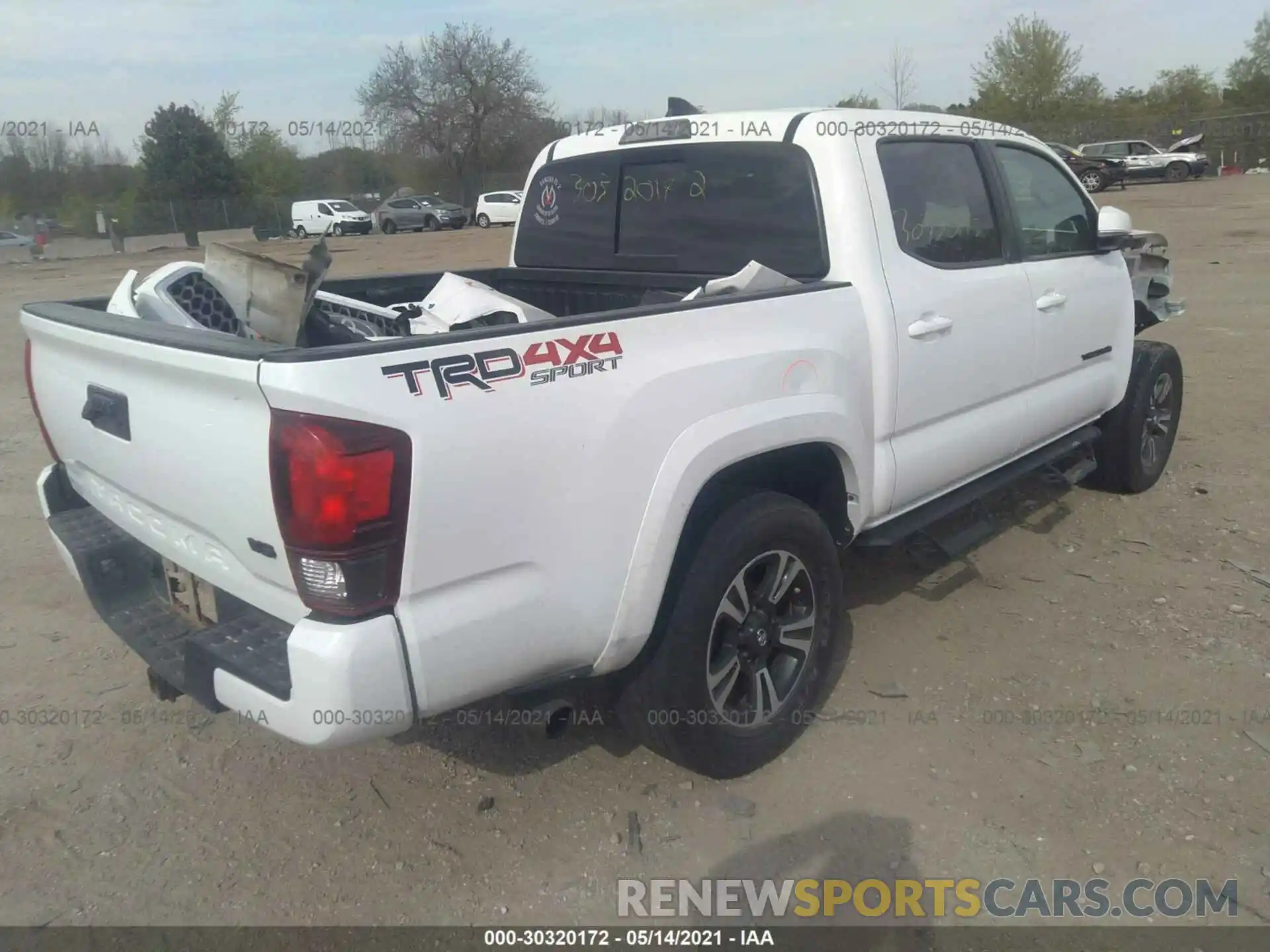 4 Photograph of a damaged car 3TMCZ5AN7KM207320 TOYOTA TACOMA 4WD 2019