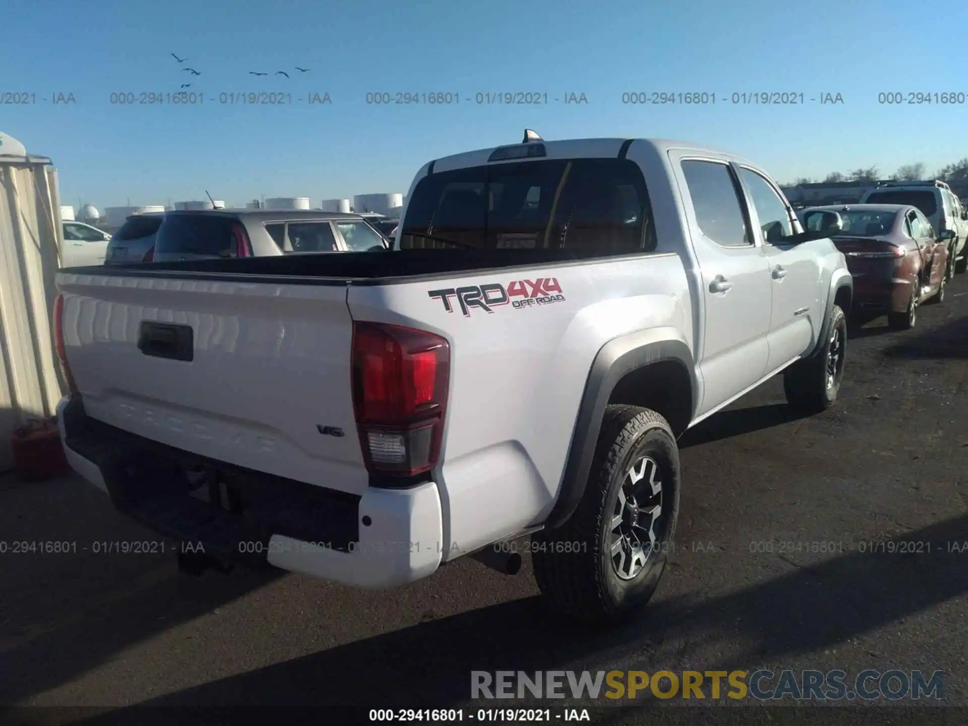 4 Photograph of a damaged car 3TMCZ5AN7KM218026 TOYOTA TACOMA 4WD 2019