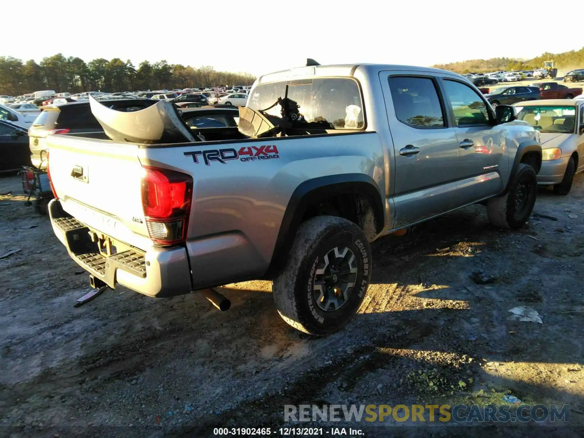 4 Photograph of a damaged car 3TMCZ5AN7KM220939 TOYOTA TACOMA 4WD 2019