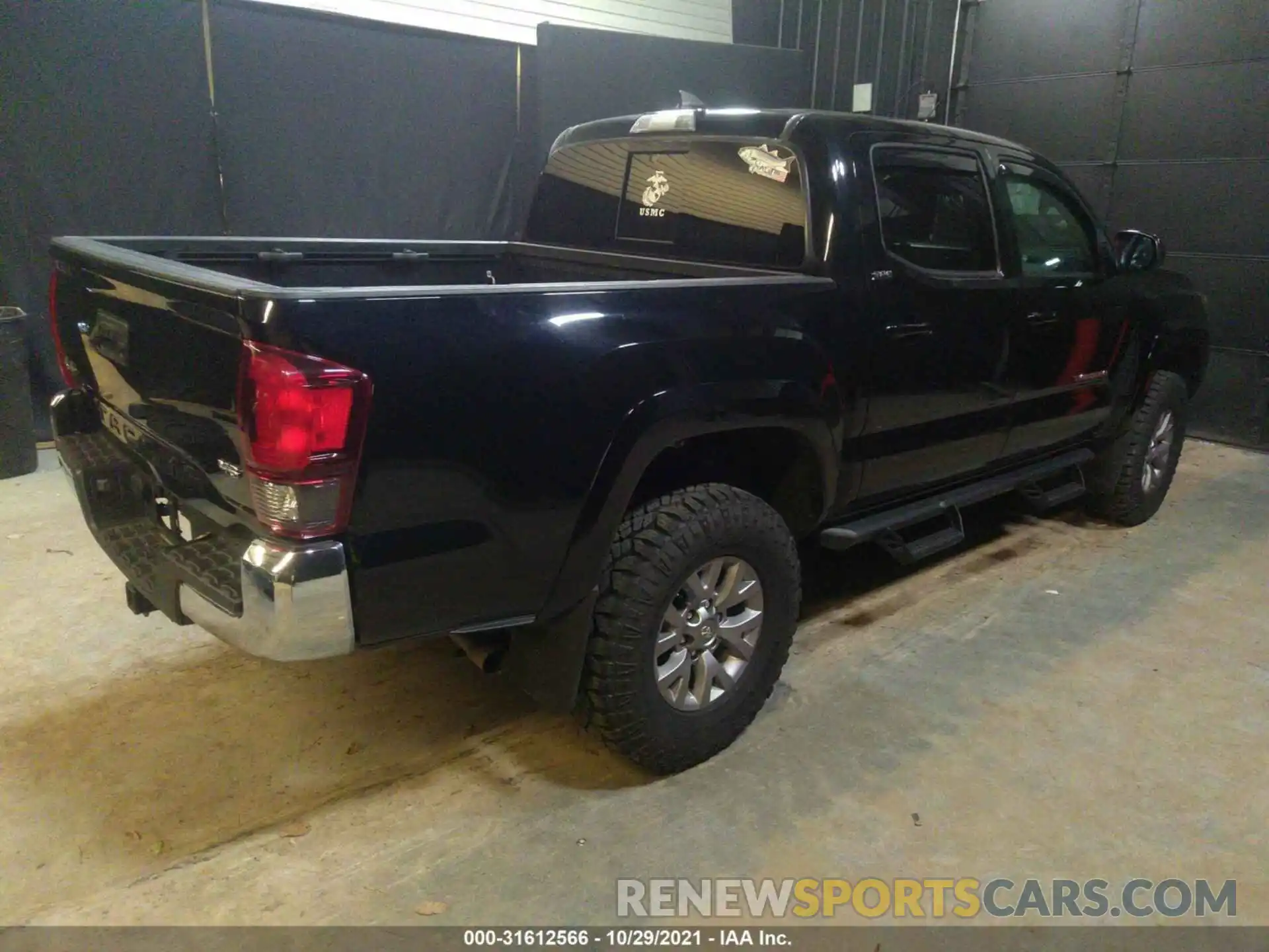 4 Photograph of a damaged car 3TMCZ5AN7KM245310 TOYOTA TACOMA 4WD 2019