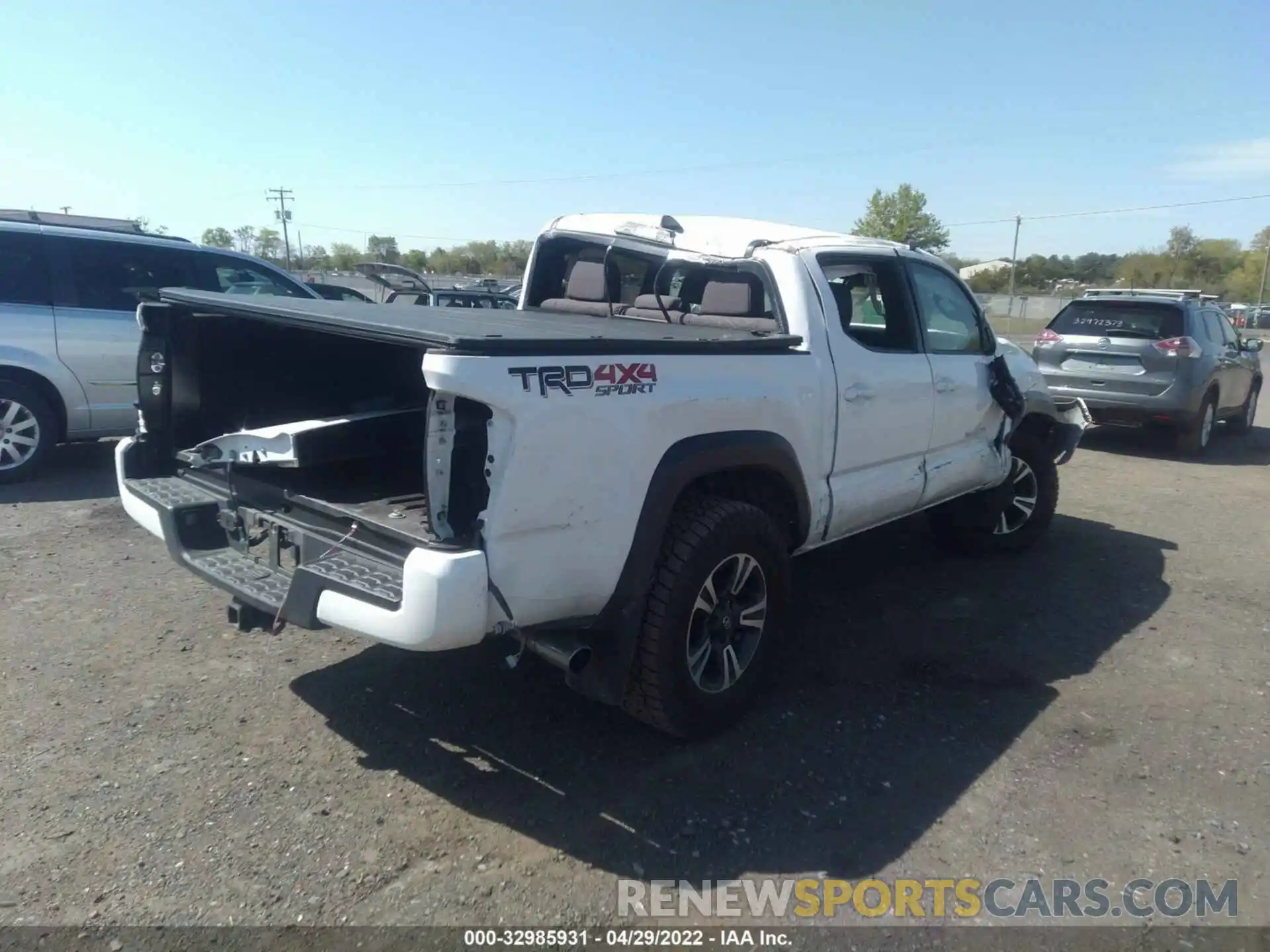 4 Photograph of a damaged car 3TMCZ5AN7KM247221 TOYOTA TACOMA 4WD 2019