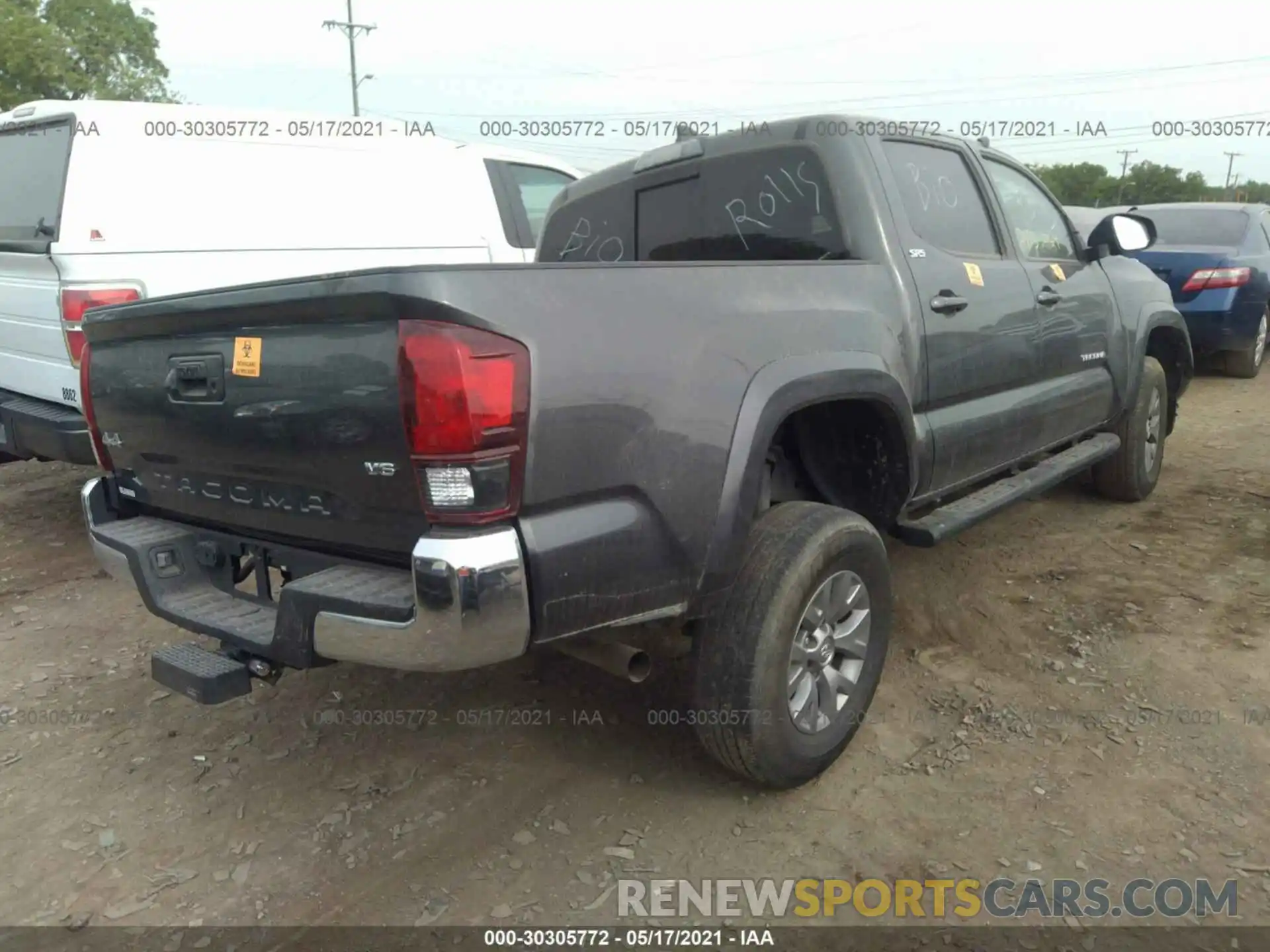 4 Photograph of a damaged car 3TMCZ5AN7KM248448 TOYOTA TACOMA 4WD 2019