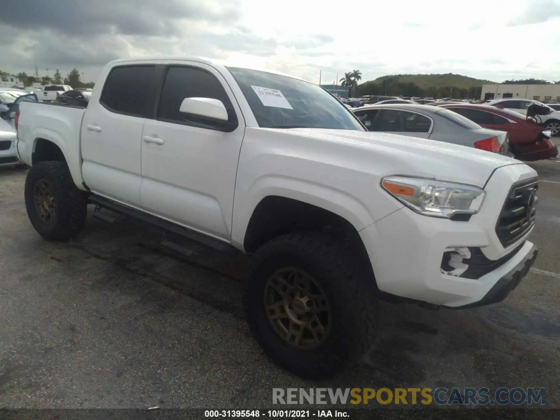 1 Photograph of a damaged car 3TMCZ5AN7KM256565 TOYOTA TACOMA 4WD 2019