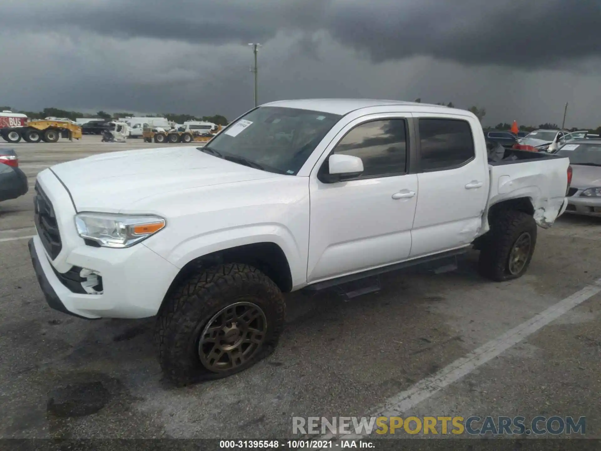 2 Photograph of a damaged car 3TMCZ5AN7KM256565 TOYOTA TACOMA 4WD 2019