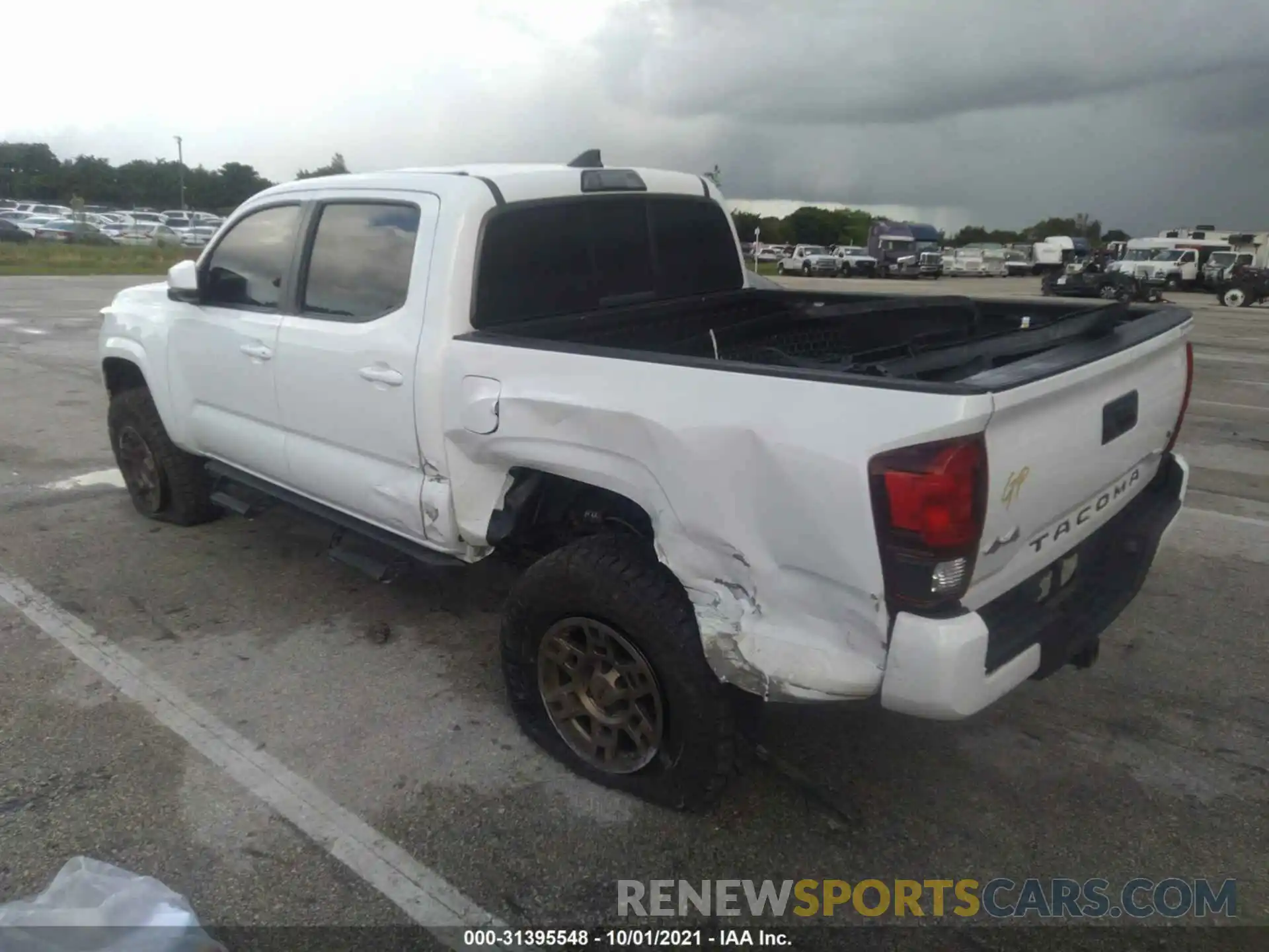 3 Photograph of a damaged car 3TMCZ5AN7KM256565 TOYOTA TACOMA 4WD 2019