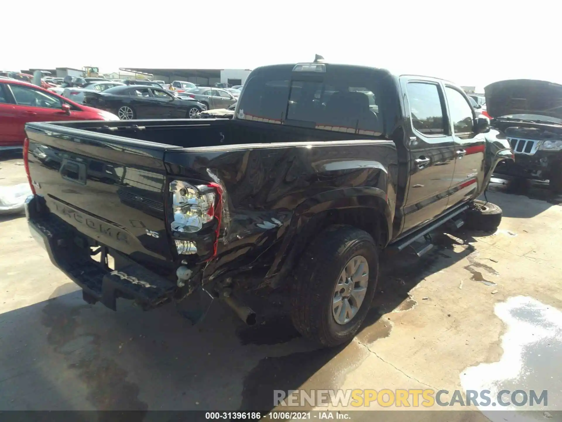 4 Photograph of a damaged car 3TMCZ5AN7KM263161 TOYOTA TACOMA 4WD 2019