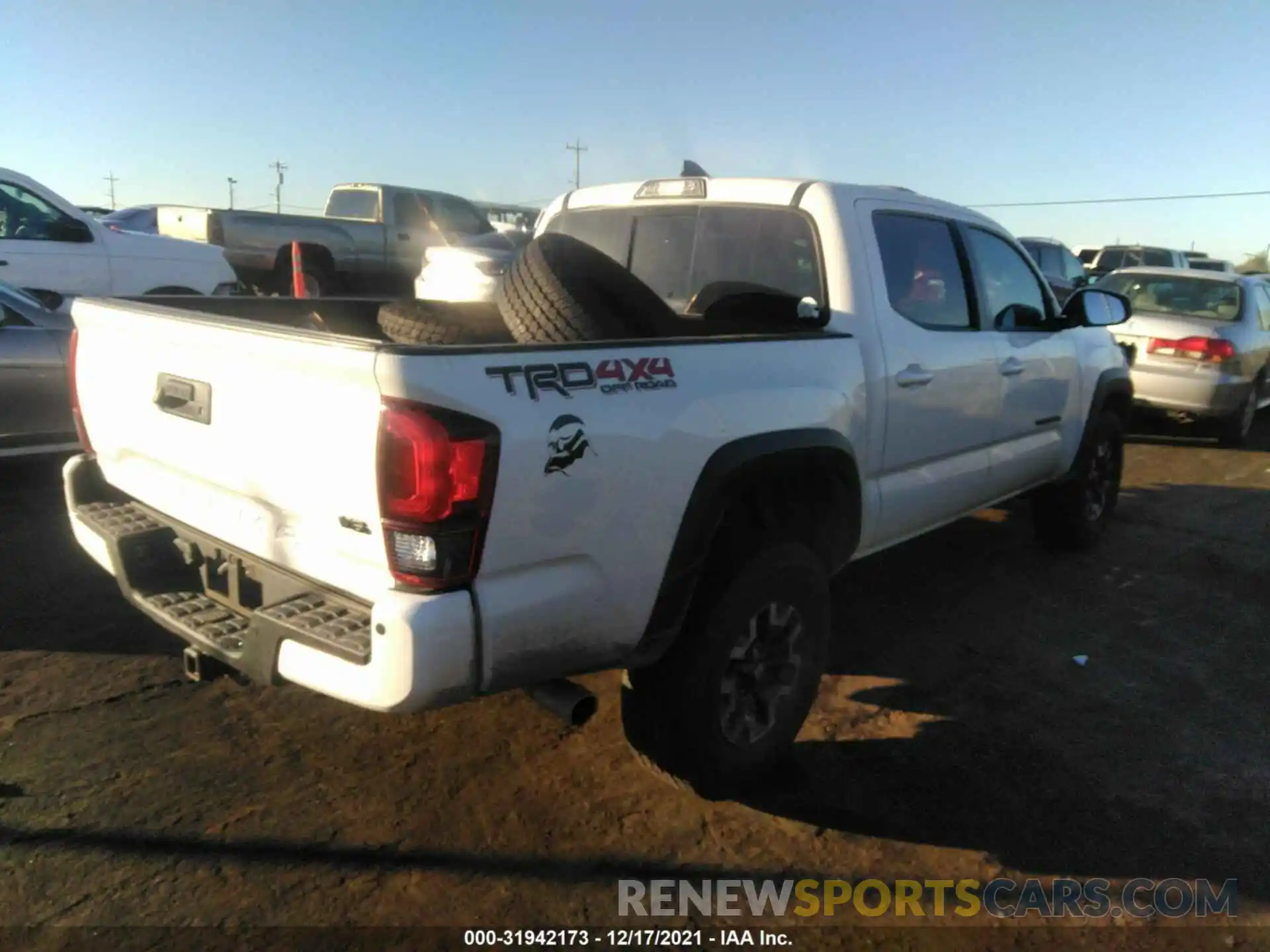 4 Photograph of a damaged car 3TMCZ5AN7KM266755 TOYOTA TACOMA 4WD 2019